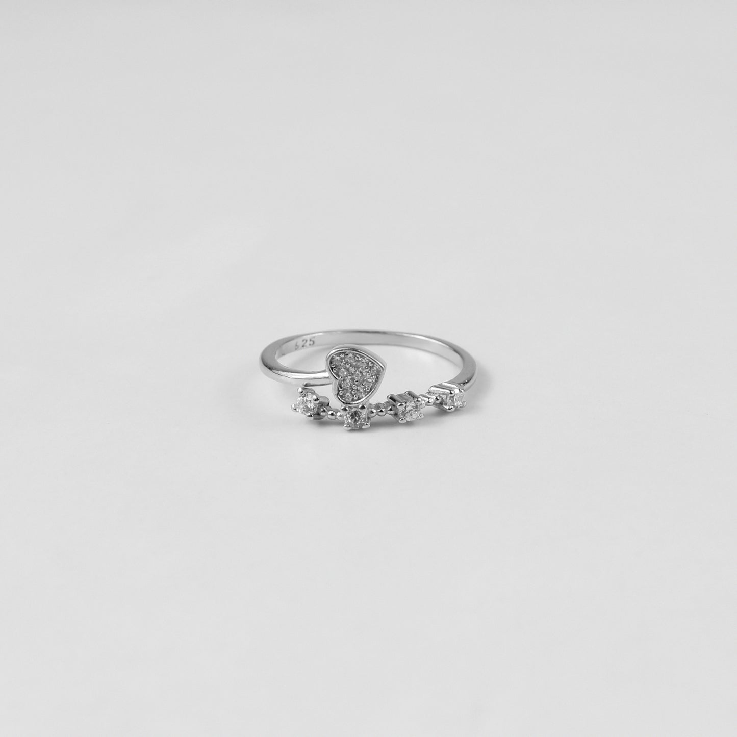 Lunar Echo Ring, meticulously handcrafted from premium 925 sterling silver, boasting a celestial-inspired design that captures the essence of the moon's ethereal beauty. With its intricate details and radiant silver sheen, this ring serves as a timeless accessory for those drawn to elegance and cosmic charm.