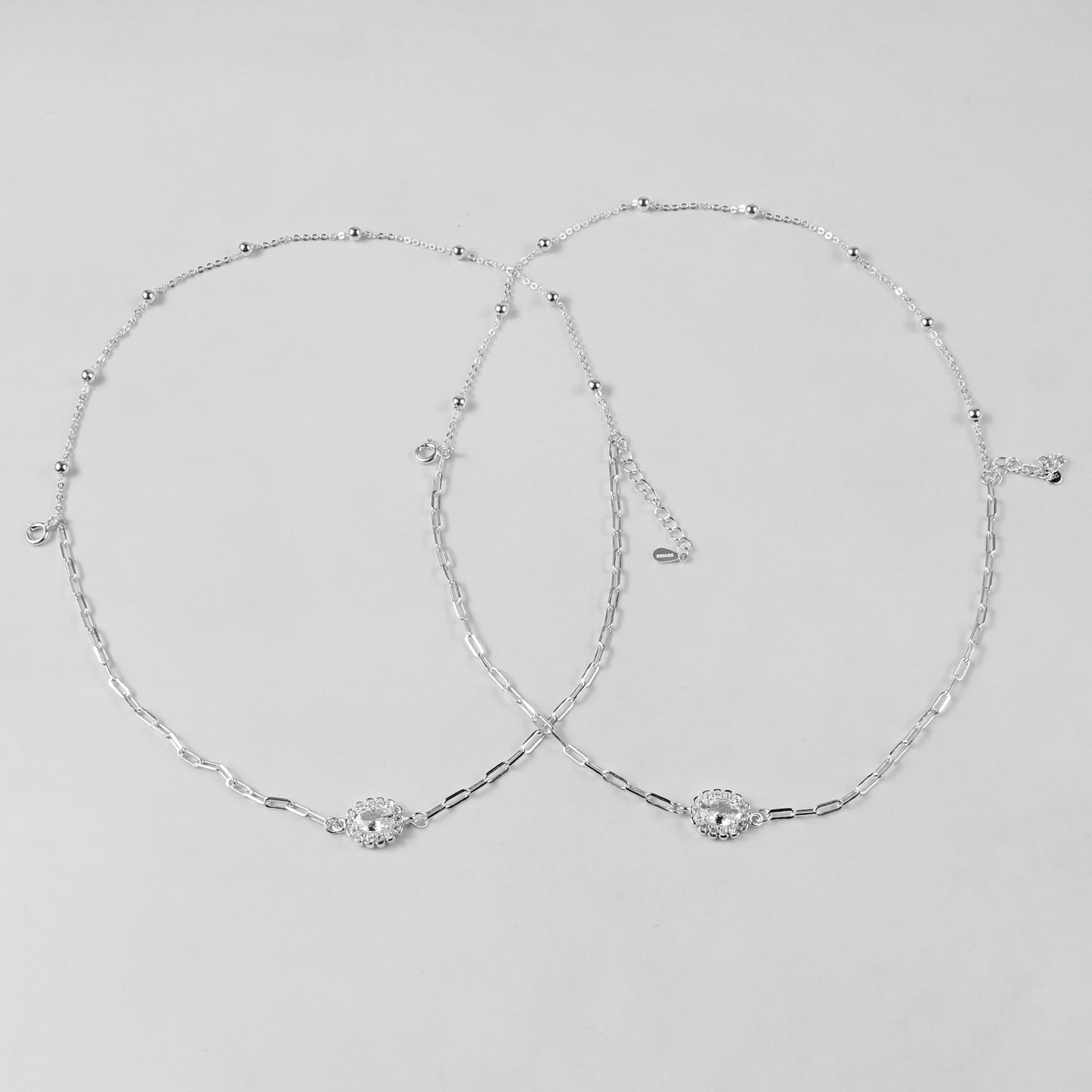A sophisticated set of 'Serein Anklets,' made with 925 sterling silver, blending timeless elegance with a serene and flowing design.