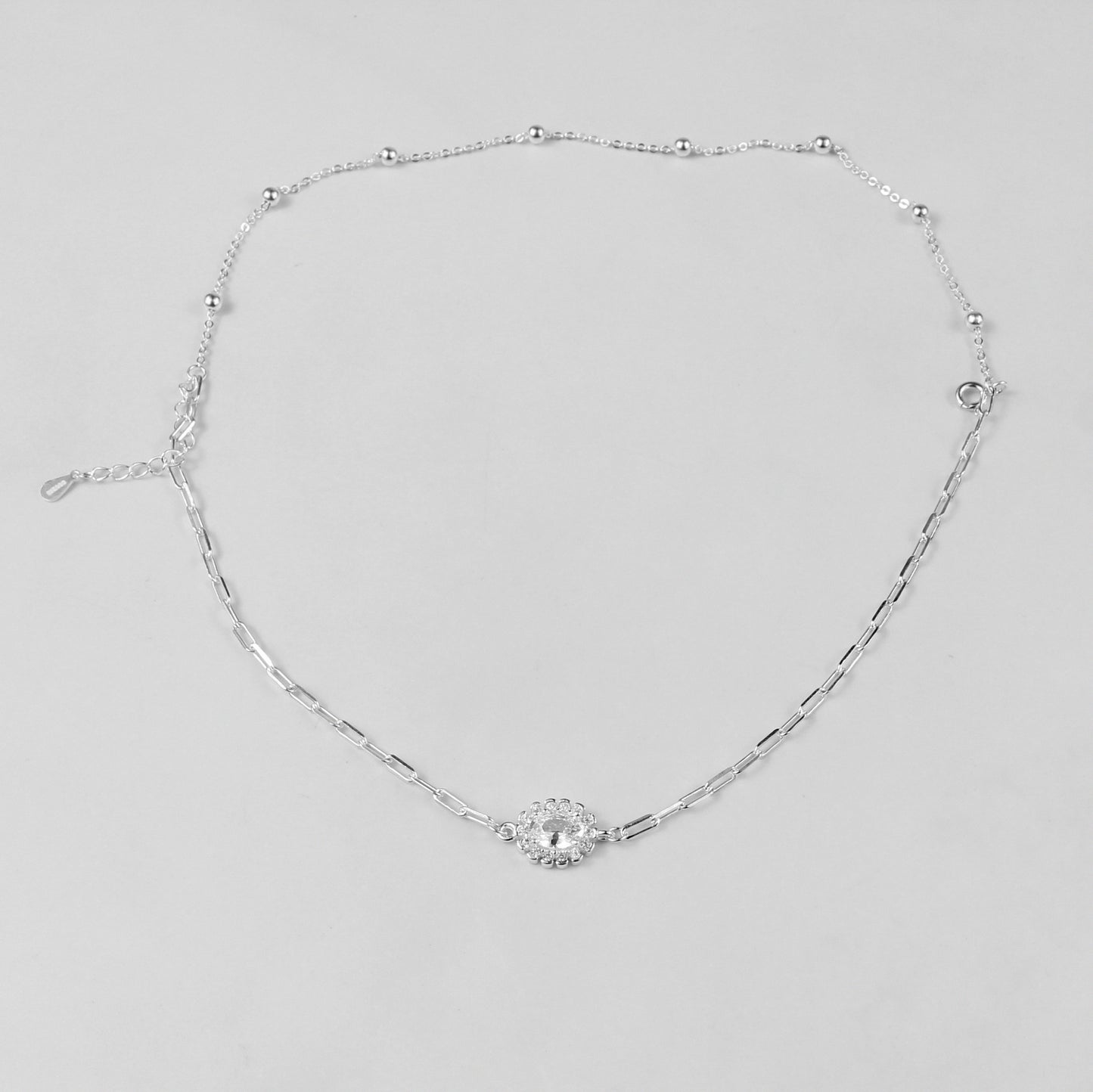 A sophisticated set of 'Serein Anklets,' made with 925 sterling silver, blending timeless elegance with a serene and flowing design.