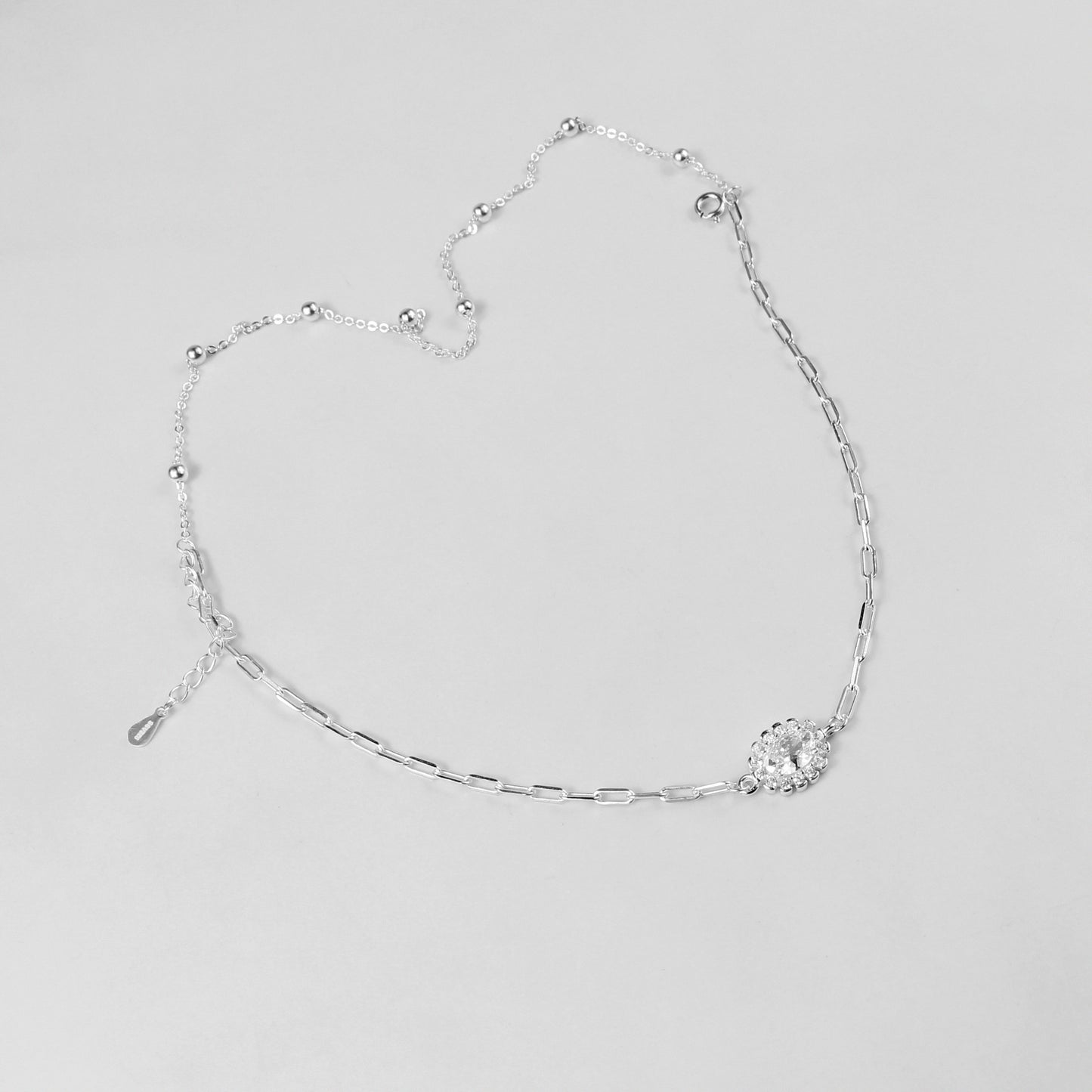 A sophisticated set of 'Serein Anklets,' made with 925 sterling silver, blending timeless elegance with a serene and flowing design.