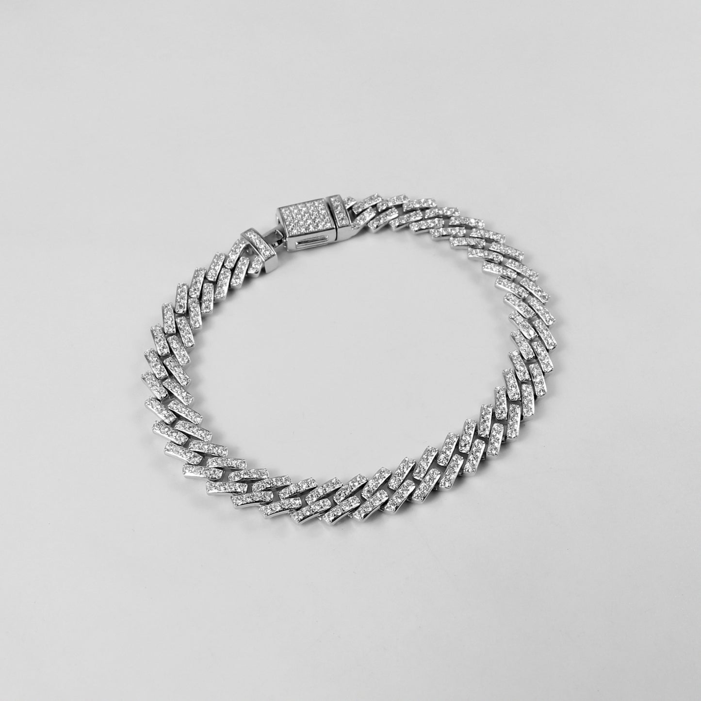 The 'Arctic Blaze' bracelet, crafted from 925 sterling silver, featuring a bold design that combines the icy brilliance of the Arctic with a fiery, radiant glow.