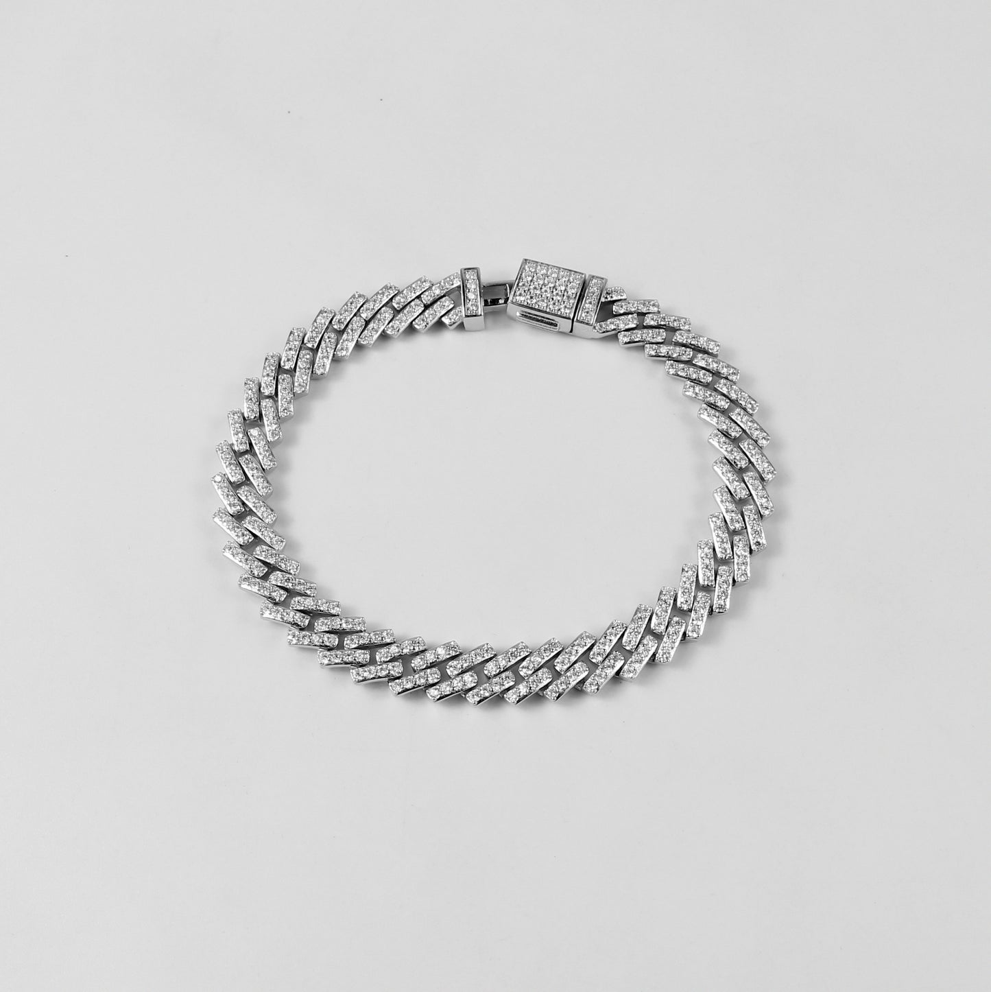 The 'Arctic Blaze' bracelet, crafted from 925 sterling silver, featuring a bold design that combines the icy brilliance of the Arctic with a fiery, radiant glow.