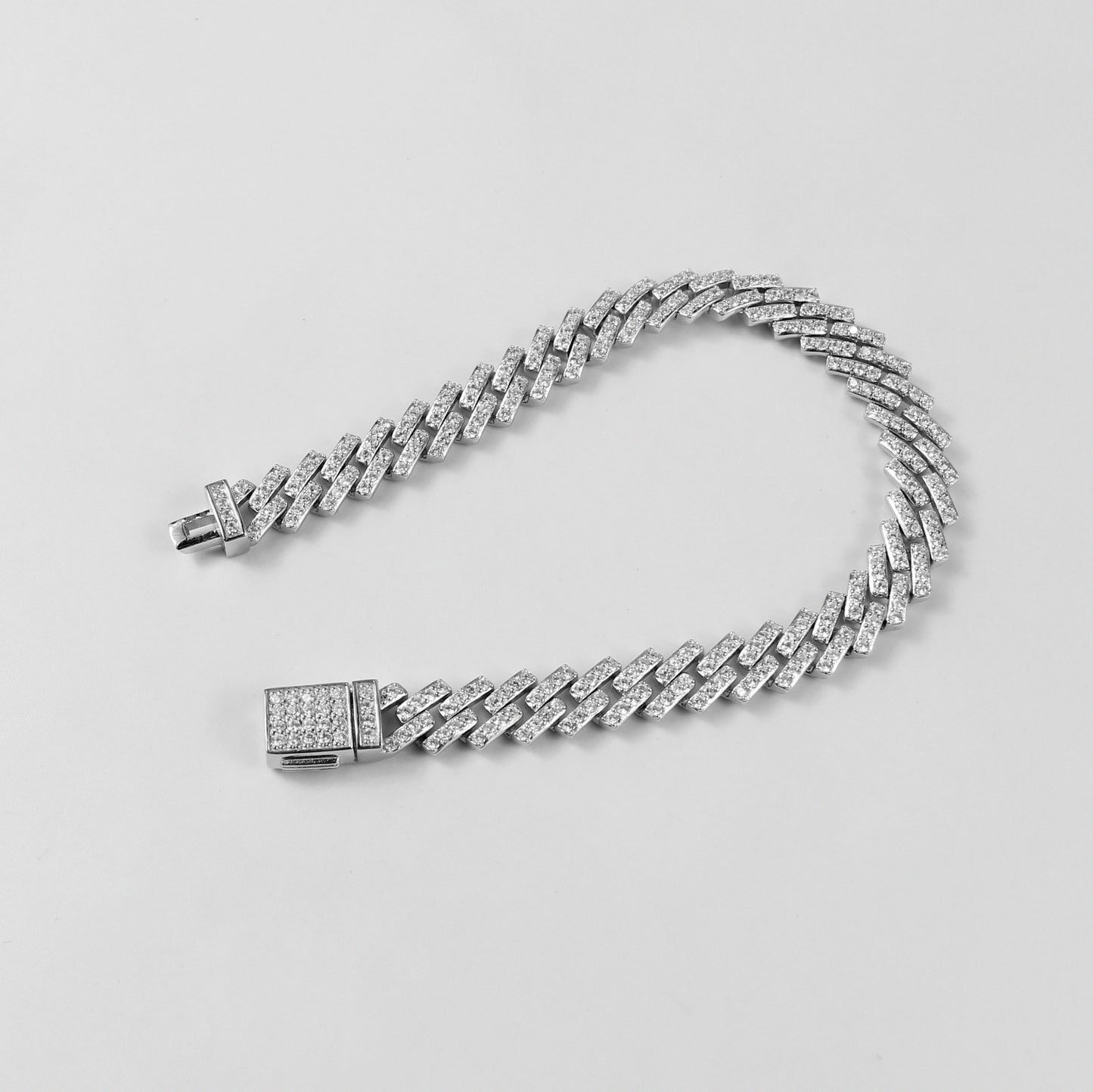 The 'Arctic Blaze' bracelet, crafted from 925 sterling silver, featuring a bold design that combines the icy brilliance of the Arctic with a fiery, radiant glow.