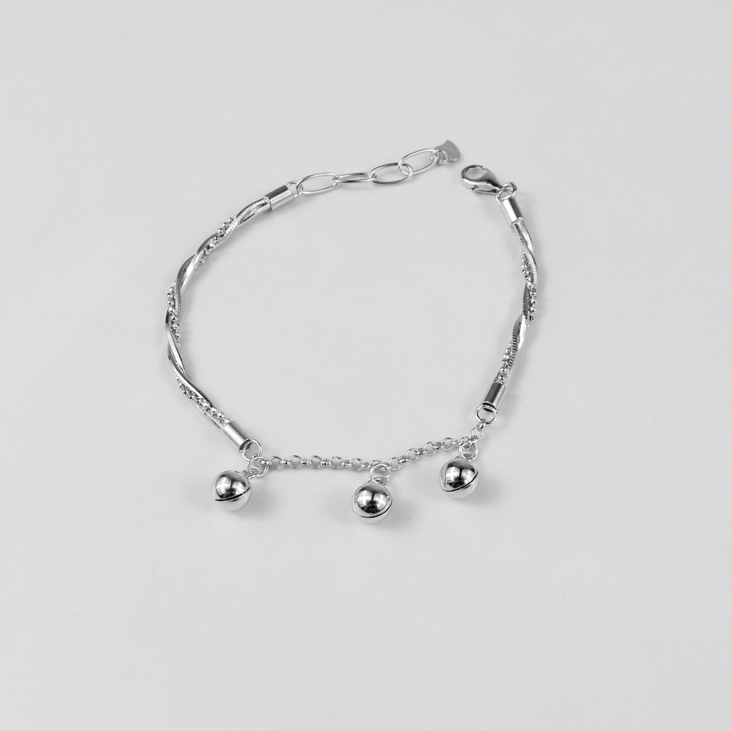 A refined 'Chained Harmony' bracelet in 925 sterling silver, showcasing a graceful chain motif that embodies timeless harmony and connection.