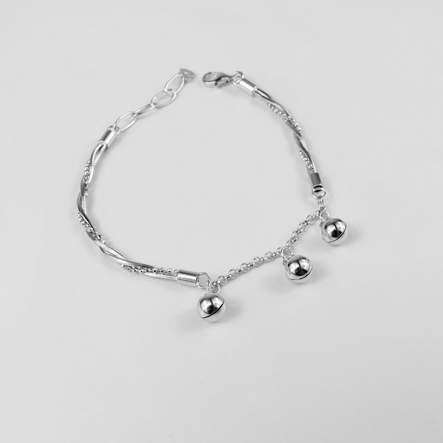 A refined 'Chained Harmony' bracelet in 925 sterling silver, showcasing a graceful chain motif that embodies timeless harmony and connection.