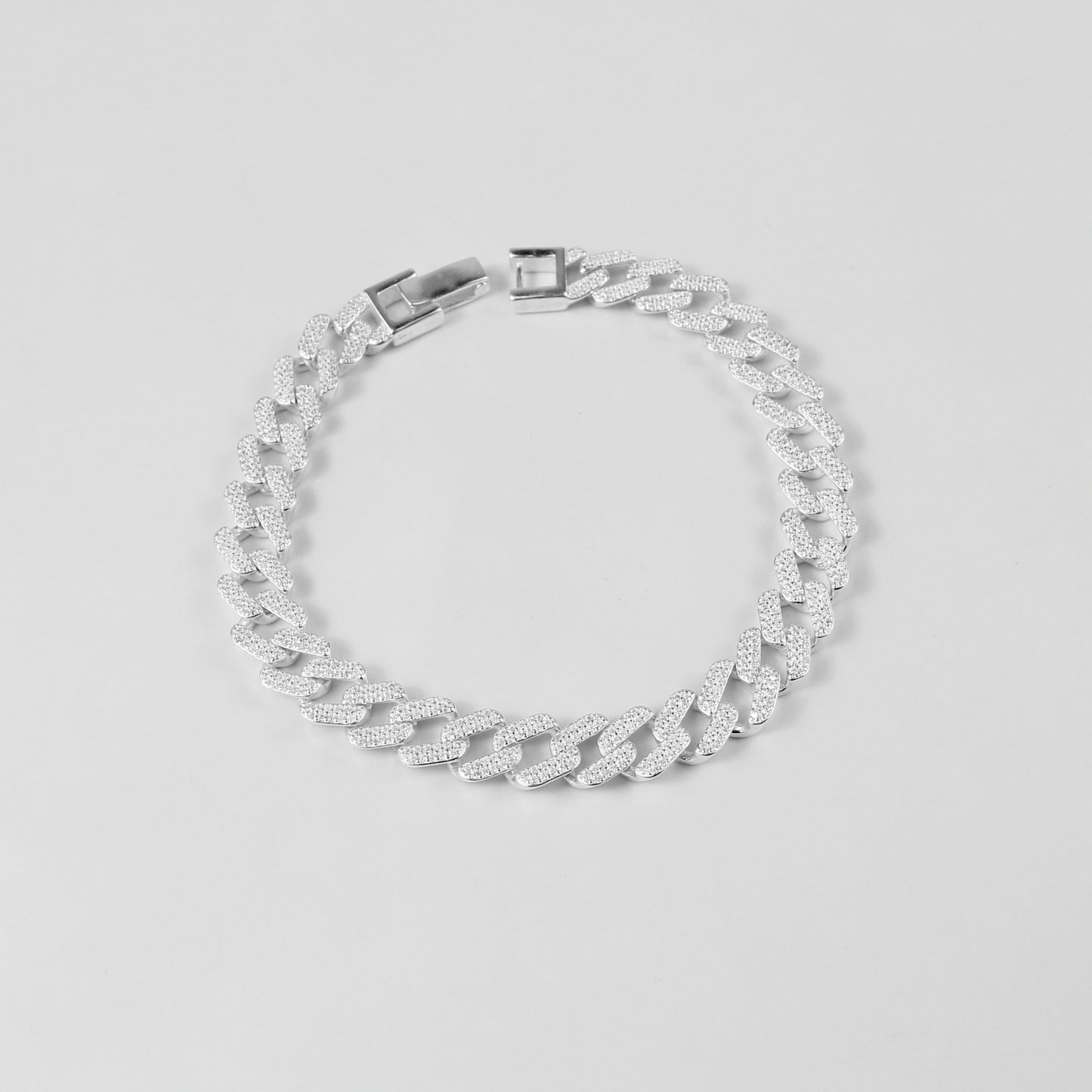 The 'Crystal Cuban' bracelet, crafted from 925 sterling silver, featuring a classic Cuban link design adorned with sparkling crystal accents.