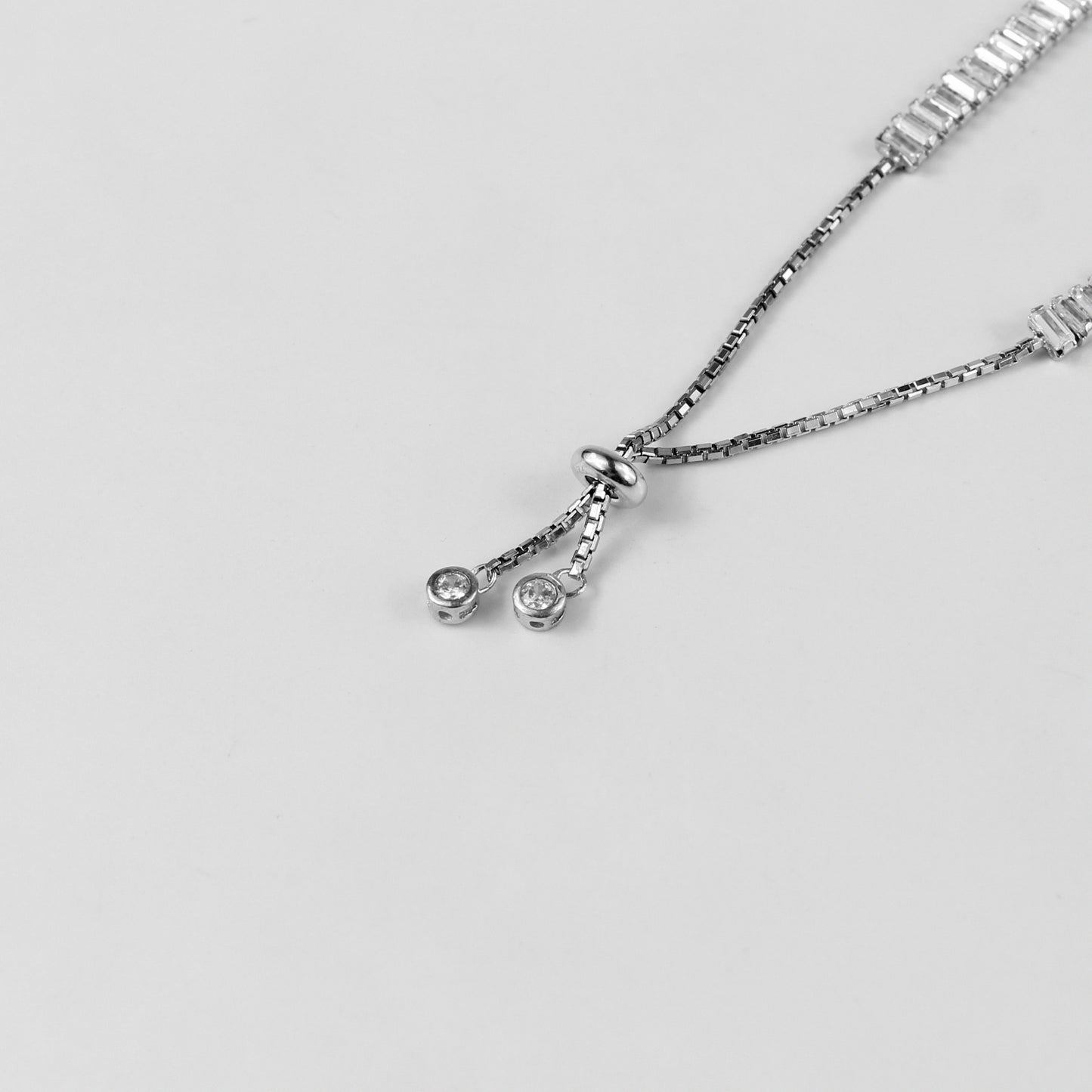 The 'Crystalvine' bracelet, a refined piece of 925 sterling silver jewelry, blending the organic charm of vines with the sparkling allure of crystals.