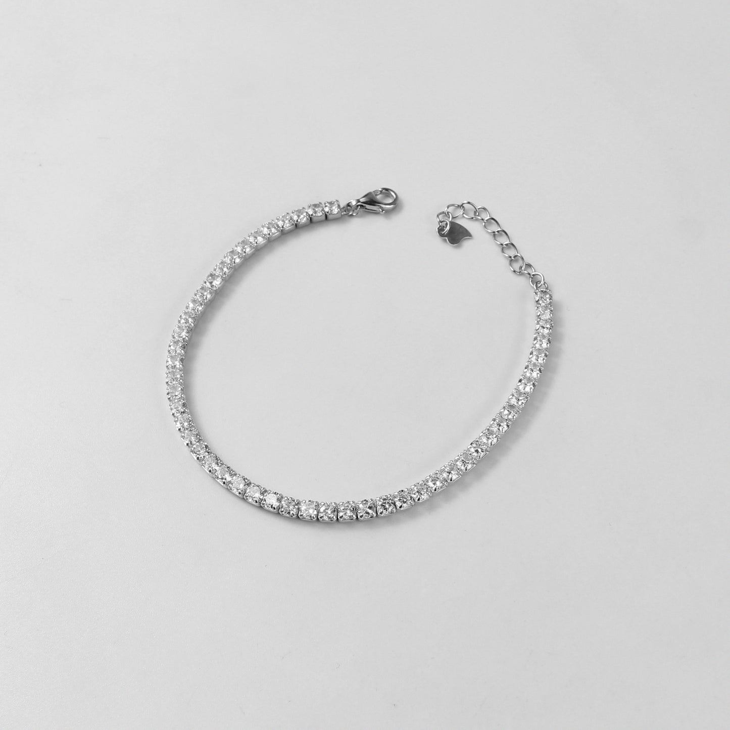 The 'Dazzle Aura' bracelet, an exquisite piece of 925 sterling silver jewelry, designed to exude a radiant and luminous aura.