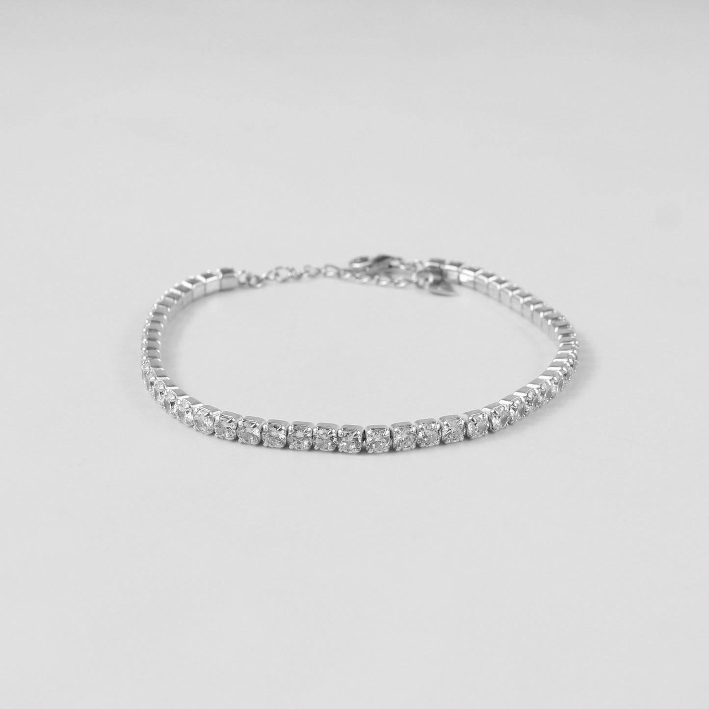 The 'Dazzle Aura' bracelet, an exquisite piece of 925 sterling silver jewelry, designed to exude a radiant and luminous aura.