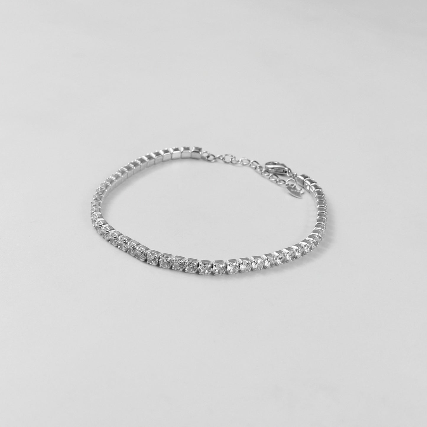 The 'Dazzle Aura' bracelet, an exquisite piece of 925 sterling silver jewelry, designed to exude a radiant and luminous aura.