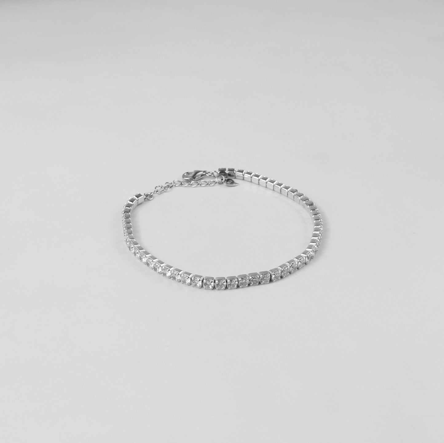 The 'Dazzle Aura' bracelet, an exquisite piece of 925 sterling silver jewelry, designed to exude a radiant and luminous aura.