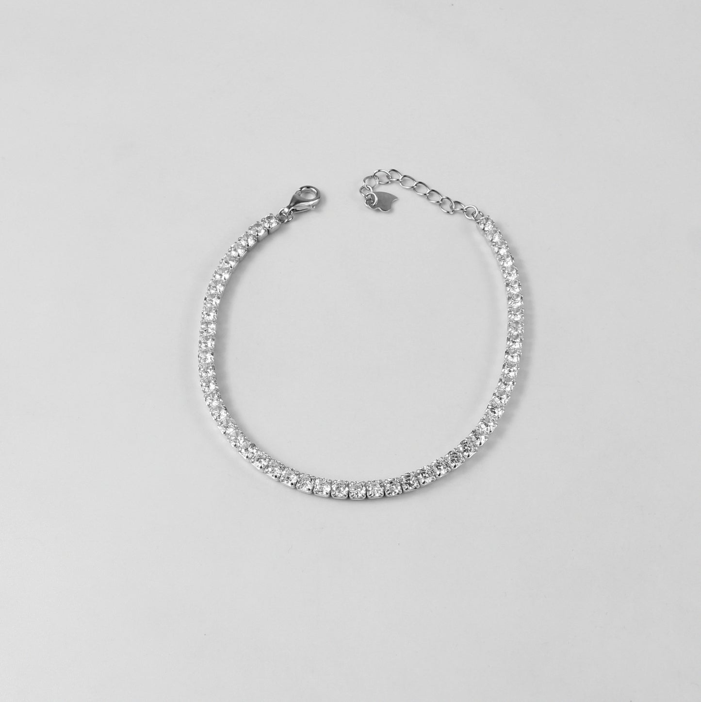 The 'Dazzle Aura' bracelet, an exquisite piece of 925 sterling silver jewelry, designed to exude a radiant and luminous aura.