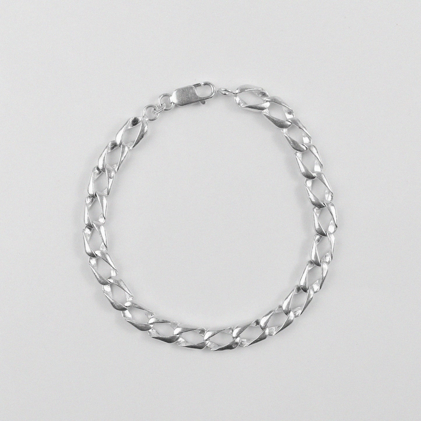 Diff Cuban Link Bracelet - A distinctive 925 sterling silver bracelet by GetTheJuice, featuring a unique twist on the classic Cuban link design, adding a modern edge to any wrist.