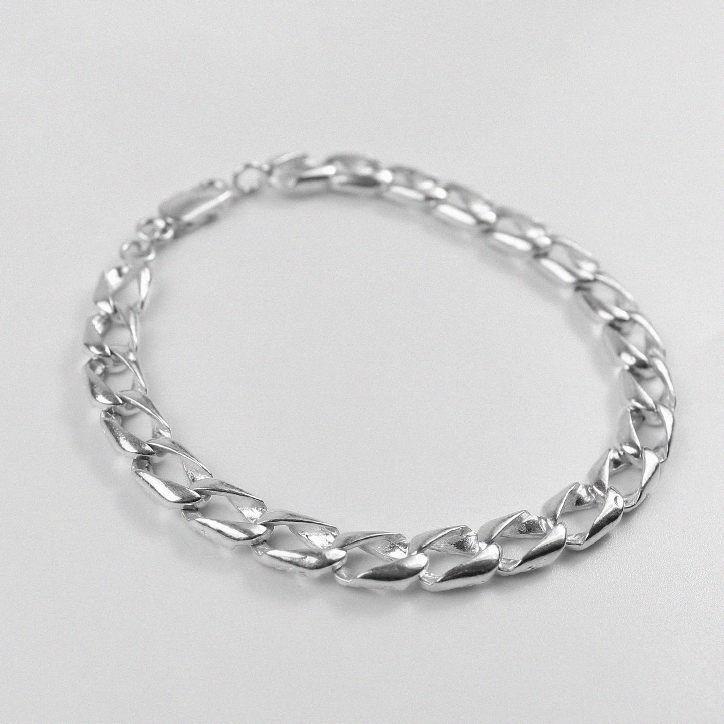 Diff Cuban Link Bracelet - A distinctive 925 sterling silver bracelet by GetTheJuice, featuring a unique twist on the classic Cuban link design, adding a modern edge to any wrist.
