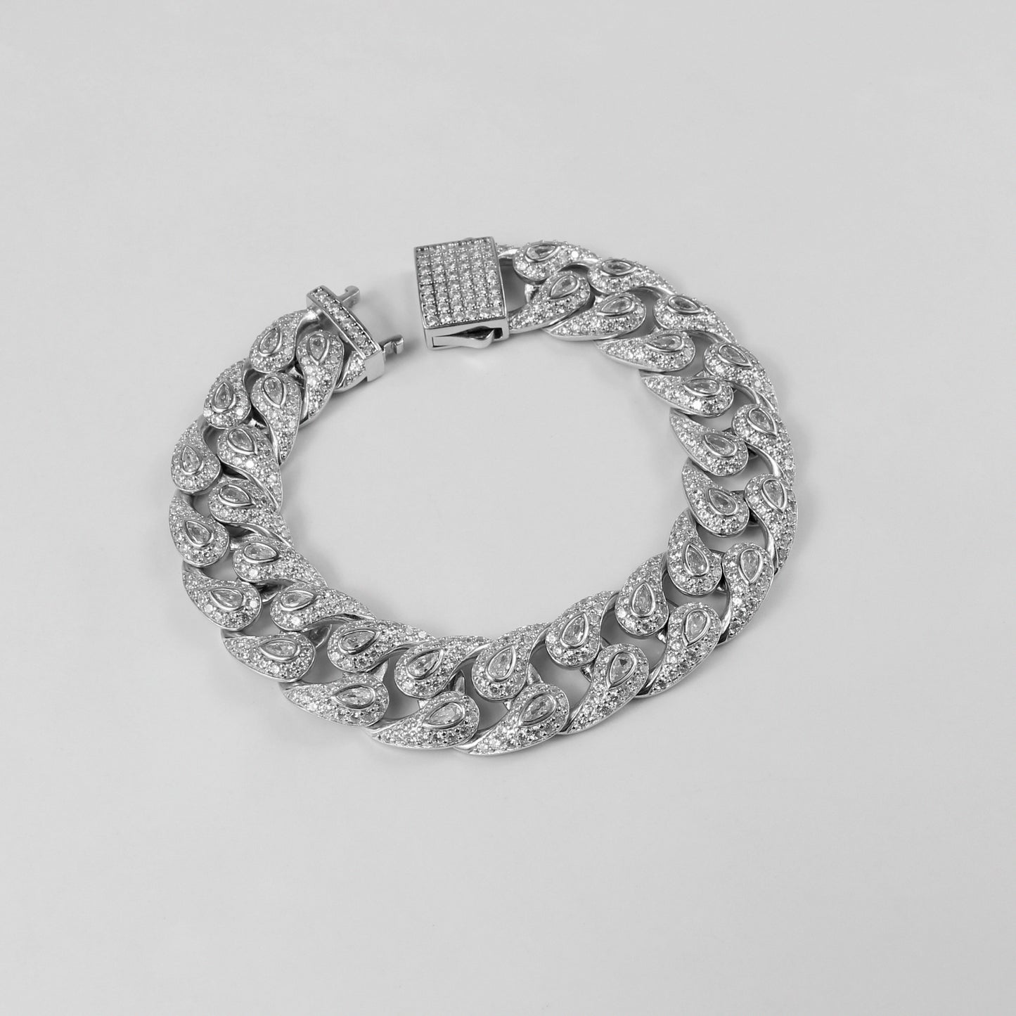 The 'Frosted Drop' bracelet, crafted from 925 sterling silver, featuring a delicate design with frosted accents and drop-shaped elements for a touch of elegance.