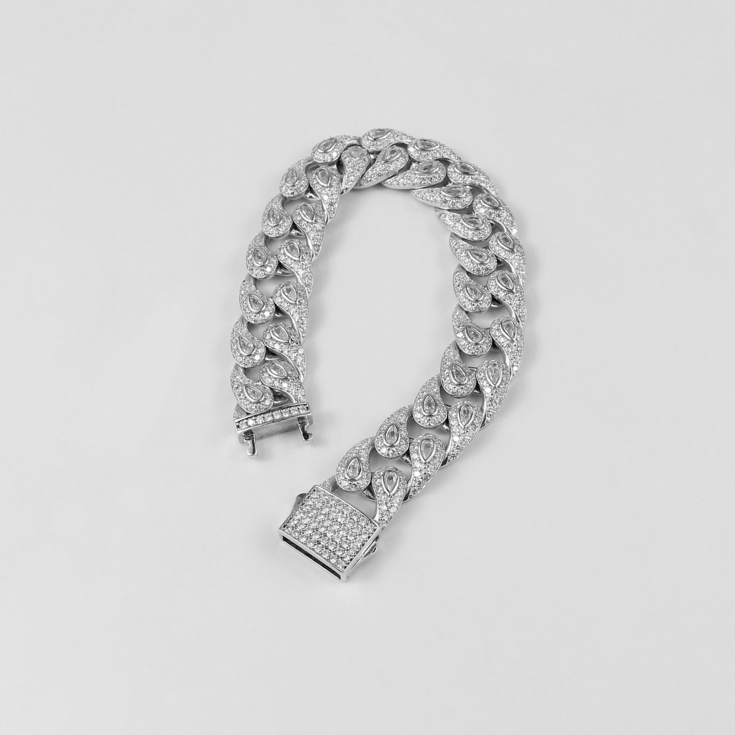 The 'Frosted Drop' bracelet, crafted from 925 sterling silver, featuring a delicate design with frosted accents and drop-shaped elements for a touch of elegance.