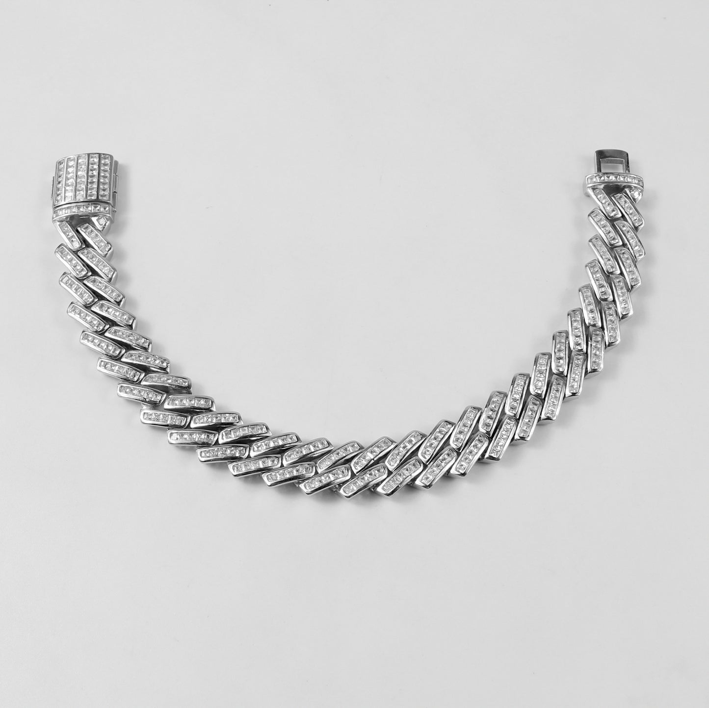 A sophisticated 'Gleam Tennis' bracelet in 925 sterling silver, showcasing a sleek and elegant line of shimmering elements.