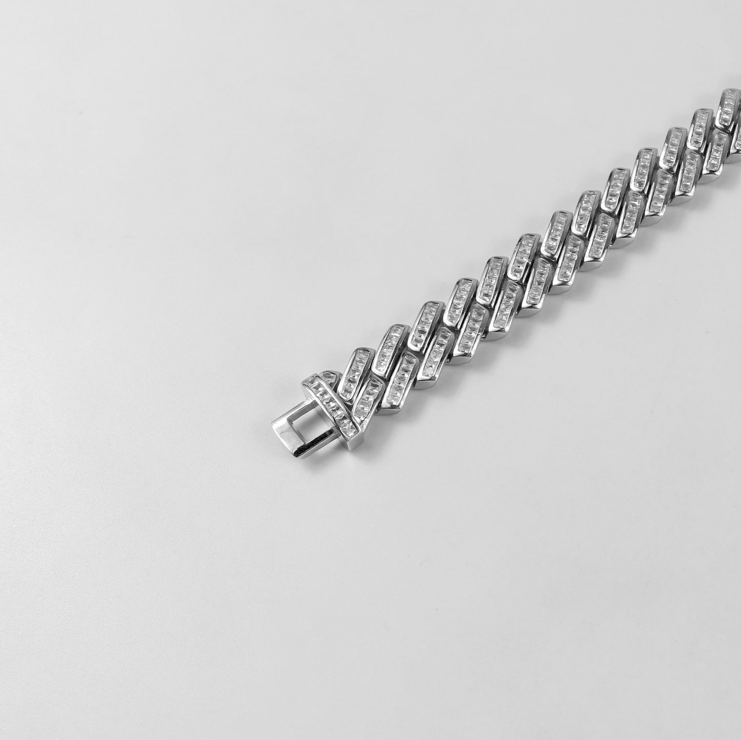 A sophisticated 'Gleam Tennis' bracelet in 925 sterling silver, showcasing a sleek and elegant line of shimmering elements.