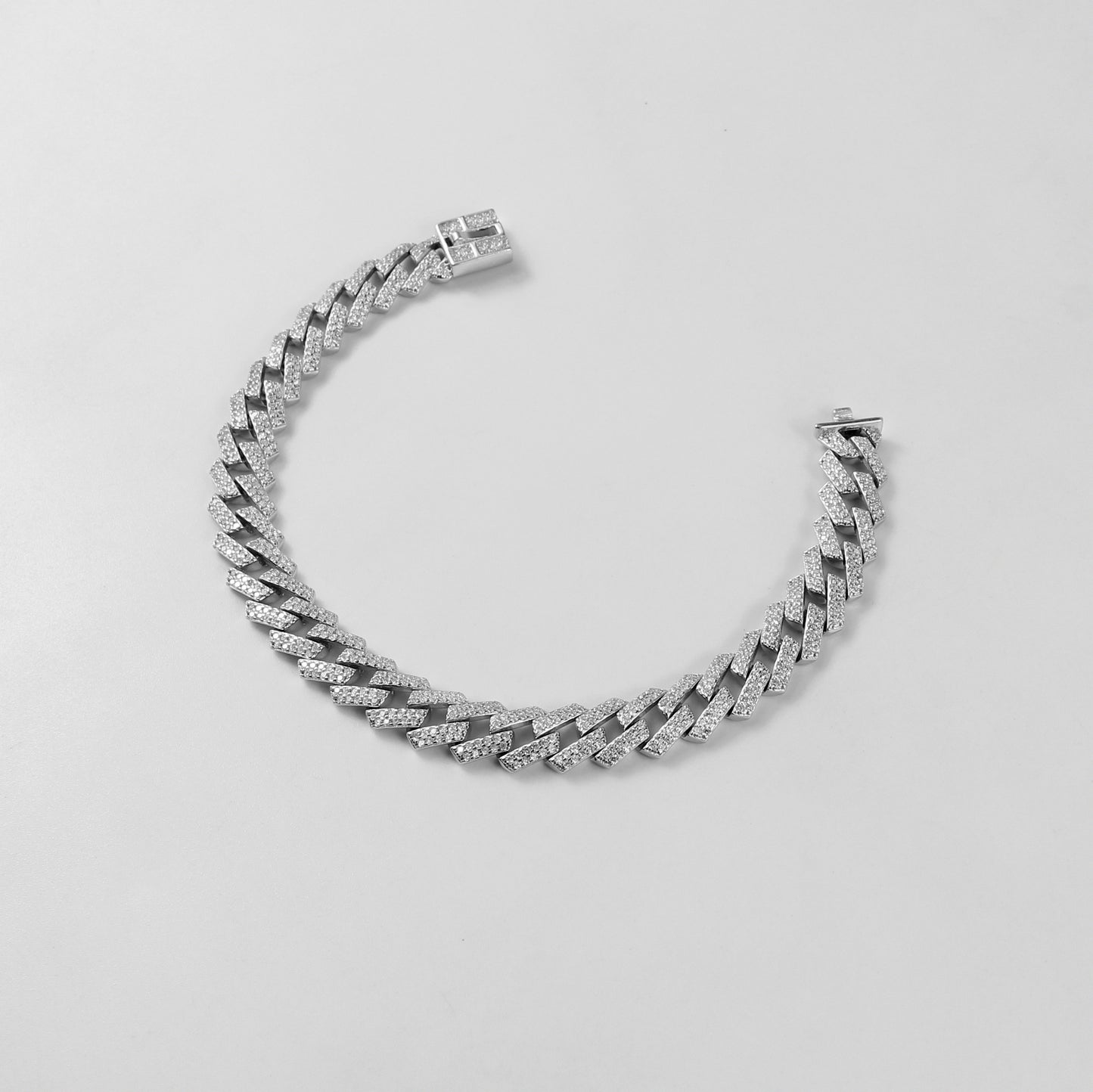 The 'Glittering Garland' bracelet, a luxurious piece of 925 sterling silver jewelry, designed with intricate detailing that mimics the beauty of a radiant garland.