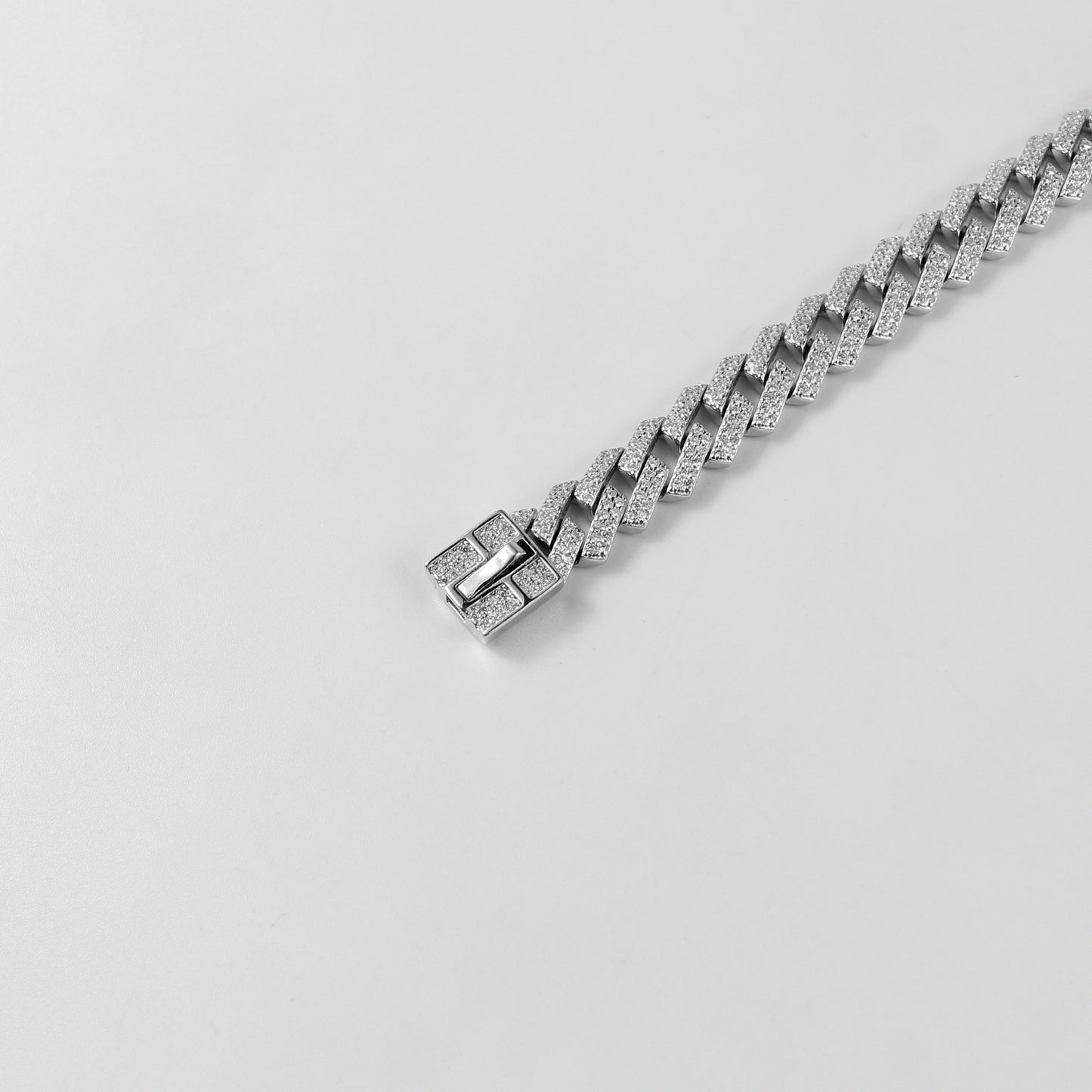 The 'Glittering Garland' bracelet, a luxurious piece of 925 sterling silver jewelry, designed with intricate detailing that mimics the beauty of a radiant garland.