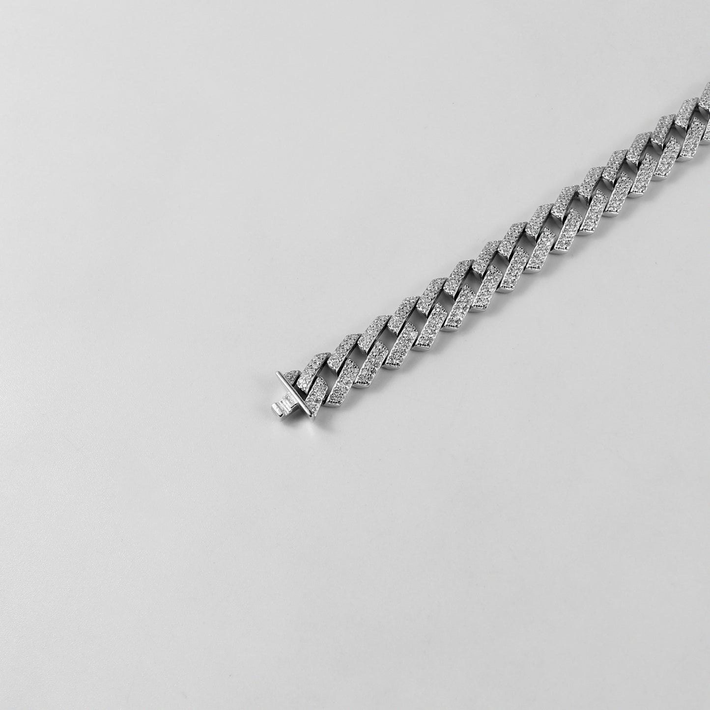 The 'Glittering Garland' bracelet, a luxurious piece of 925 sterling silver jewelry, designed with intricate detailing that mimics the beauty of a radiant garland.
