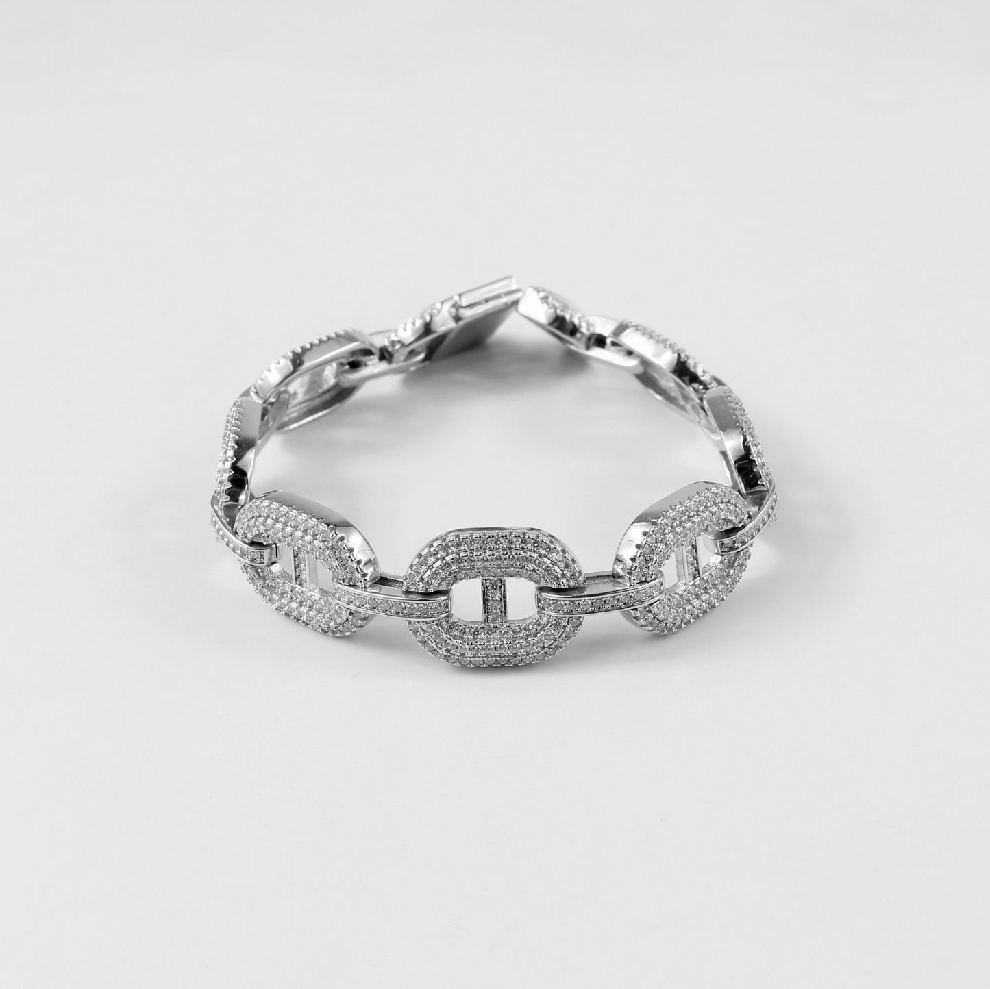 A sophisticated 925 sterling silver bracelet named 'Luxe Dew,' combining sleek lines with the delicate charm of dewdrop-inspired accents.