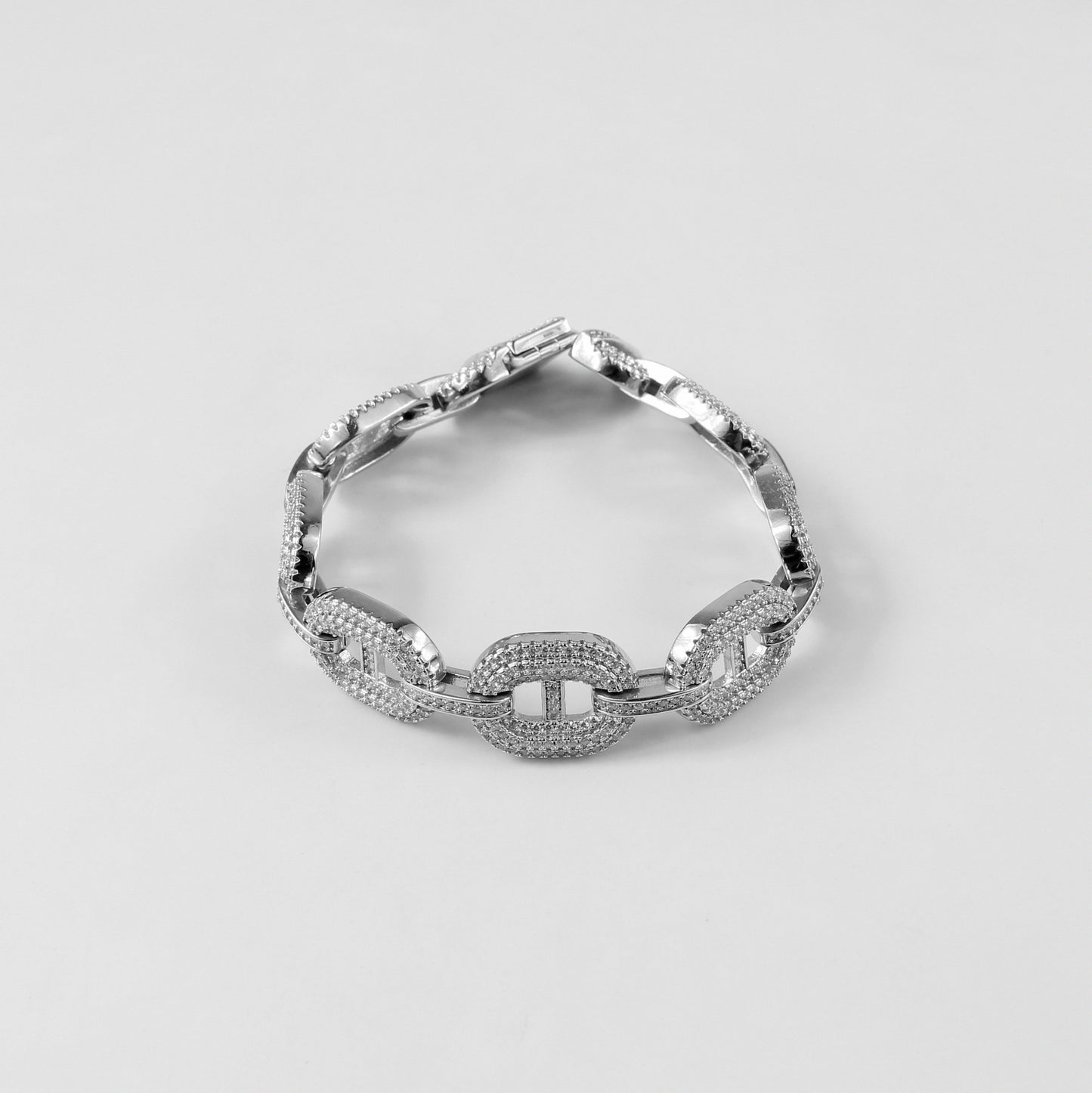A sophisticated 925 sterling silver bracelet named 'Luxe Dew,' combining sleek lines with the delicate charm of dewdrop-inspired accents.