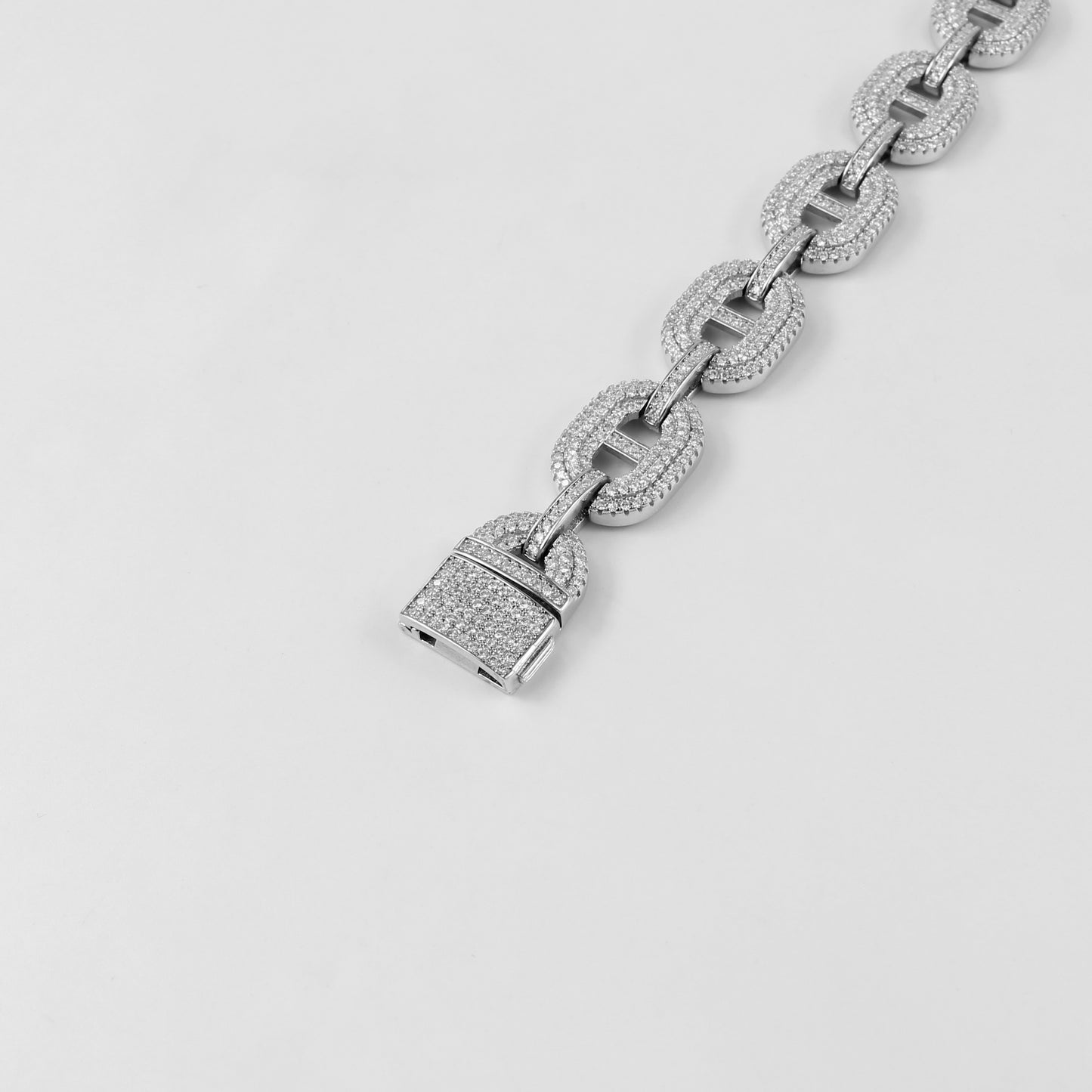 A sophisticated 925 sterling silver bracelet named 'Luxe Dew,' combining sleek lines with the delicate charm of dewdrop-inspired accents.