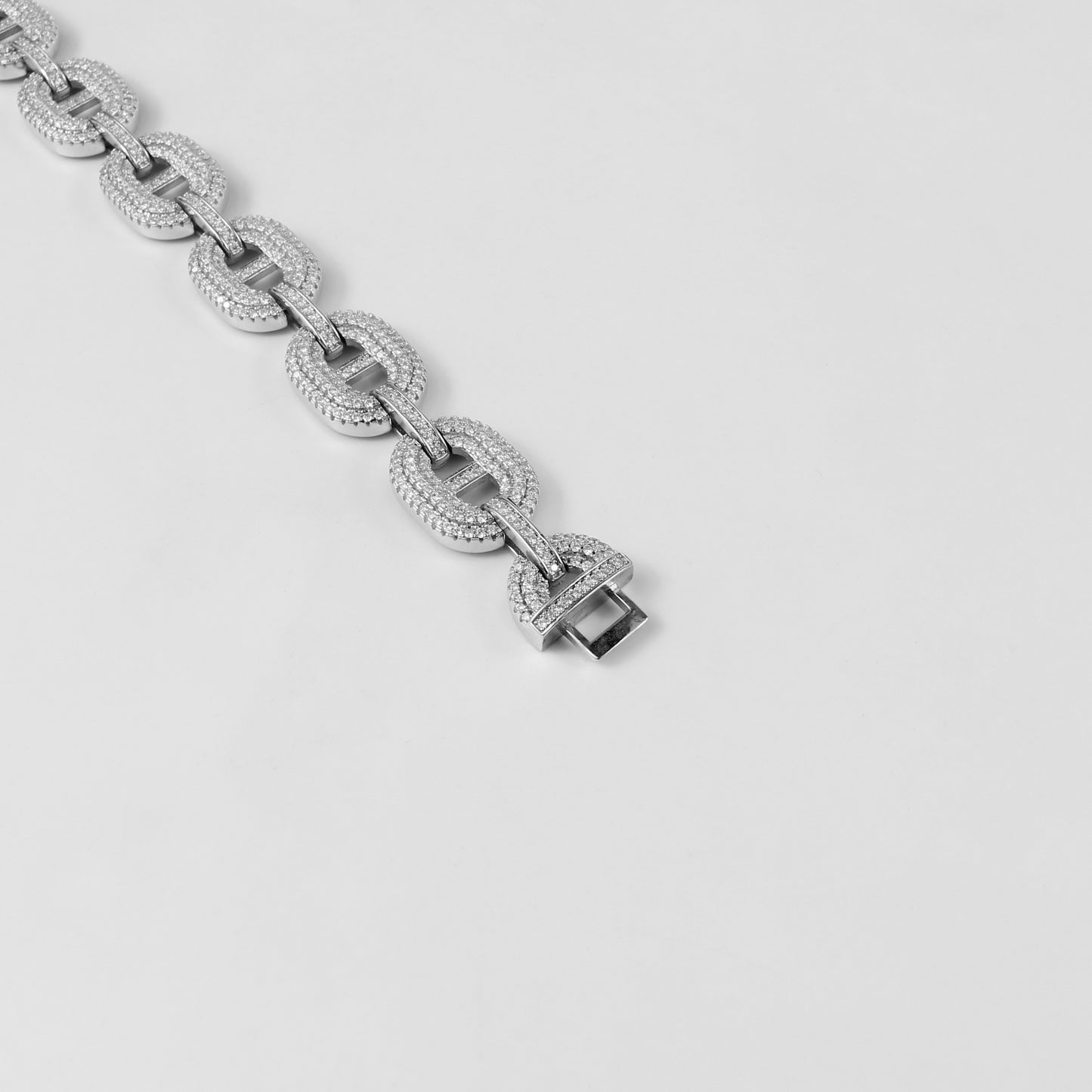 A sophisticated 925 sterling silver bracelet named 'Luxe Dew,' combining sleek lines with the delicate charm of dewdrop-inspired accents.