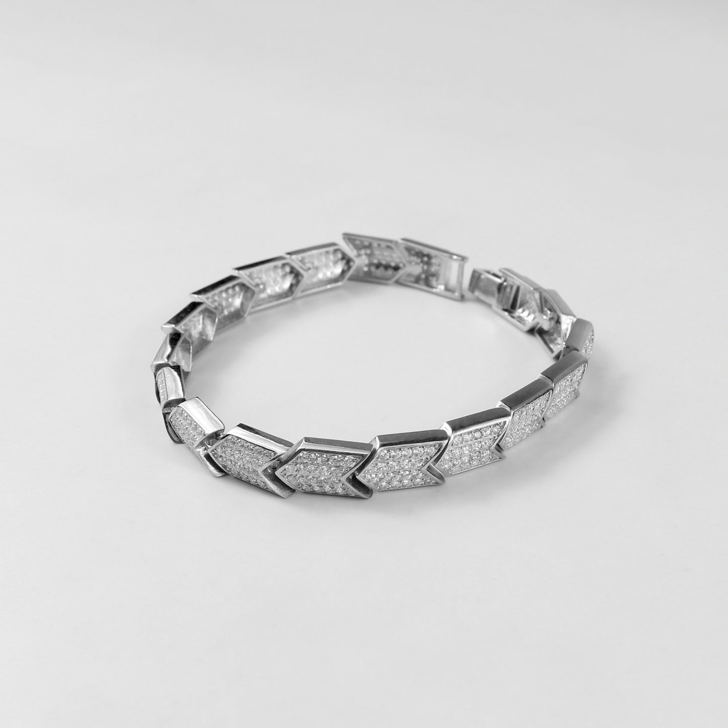 The 'Prism Link' bracelet, crafted from 925 sterling silver, featuring a unique interlocking design inspired by the multifaceted beauty of a prism.