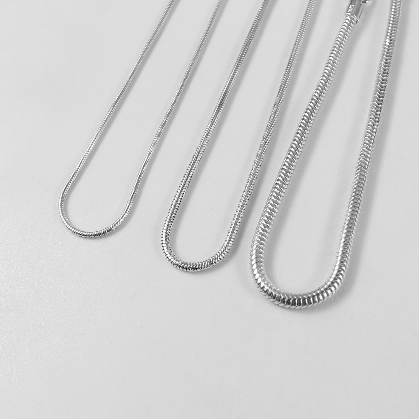 Round Snake Bracelet - A sleek 925 sterling silver bracelet by GetTheJuice, featuring a smooth and elegant round snake chain design that adds a modern touch to any wrist.