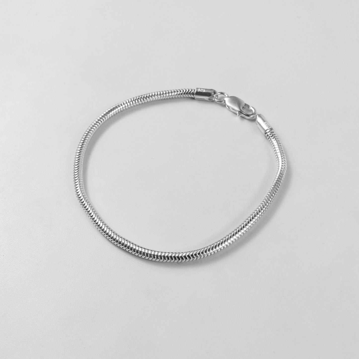 Round Snake Bracelet - A sleek 925 sterling silver bracelet by GetTheJuice, featuring a smooth and elegant round snake chain design that adds a modern touch to any wrist.