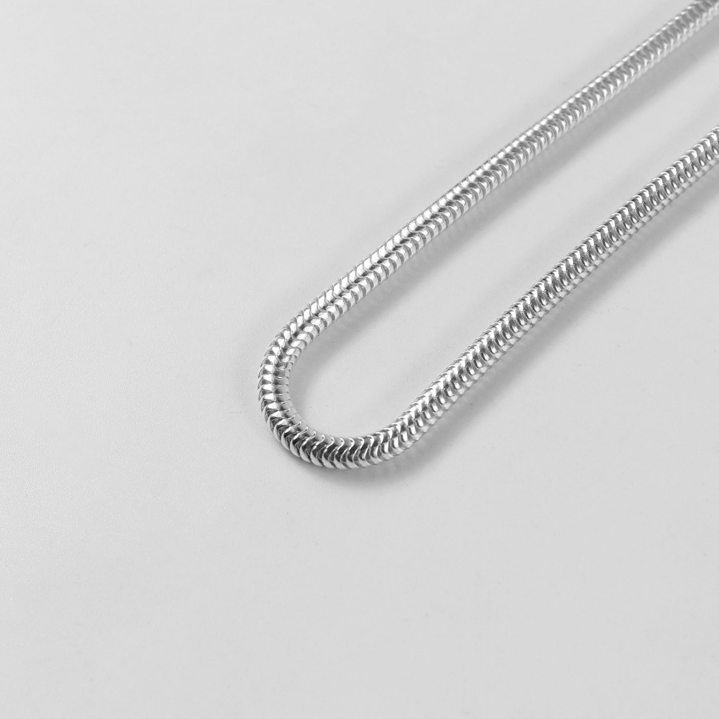 Round Snake Bracelet - A sleek 925 sterling silver bracelet by GetTheJuice, featuring a smooth and elegant round snake chain design that adds a modern touch to any wrist.