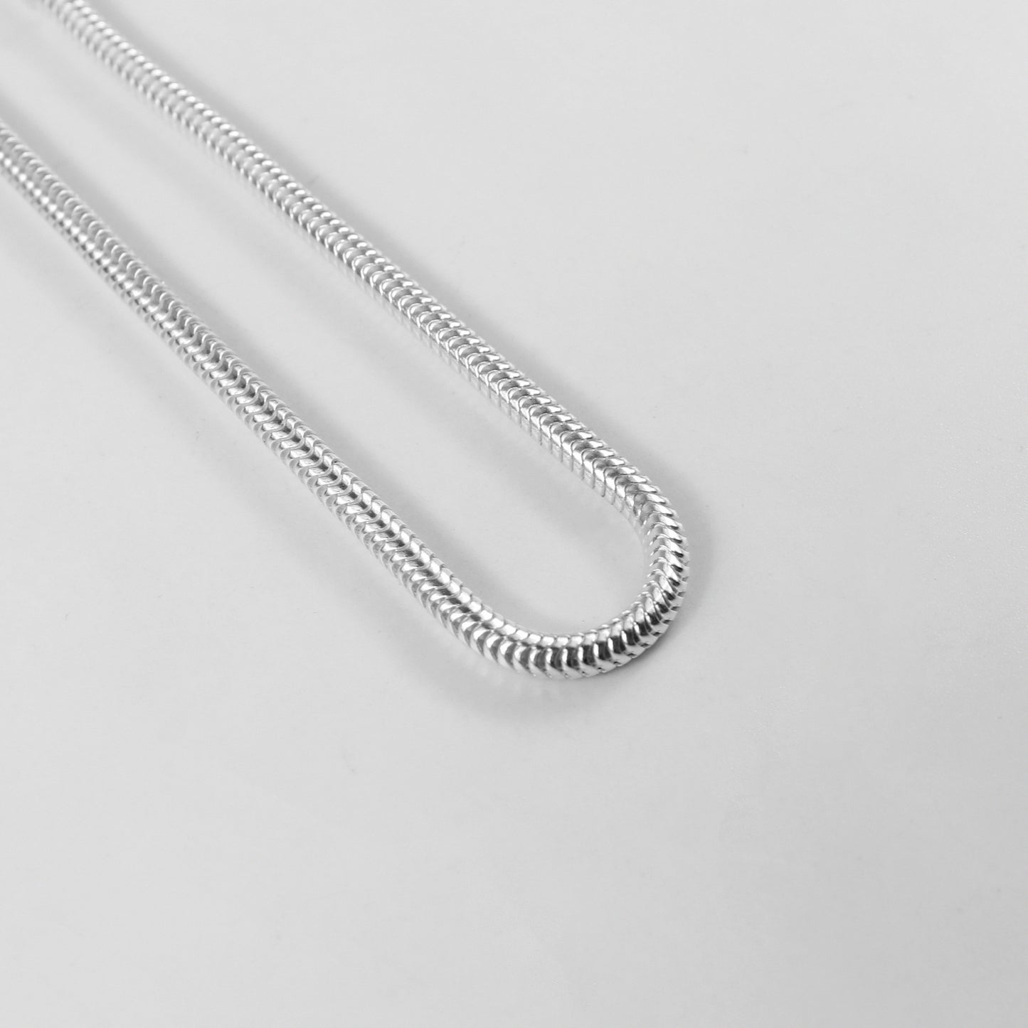 Round Snake Bracelet - A sleek 925 sterling silver bracelet by GetTheJuice, featuring a smooth and elegant round snake chain design that adds a modern touch to any wrist.