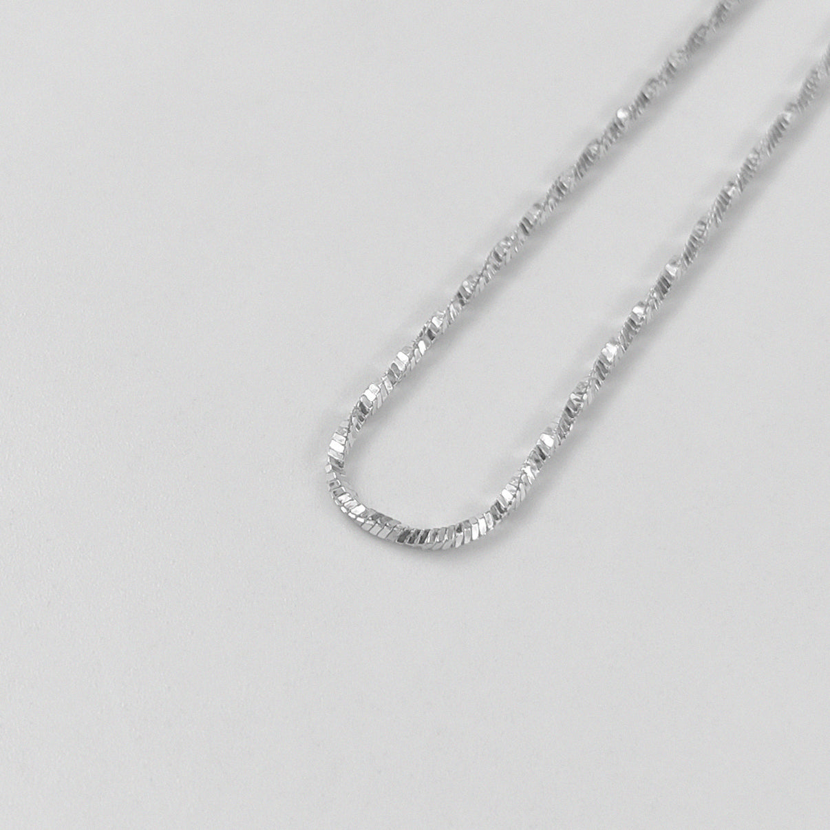 Twilight Twist Bracelet - An exquisite 925 sterling silver bracelet by GetTheJuice, showcasing a unique twilight-inspired twist pattern for a refined and graceful look.
