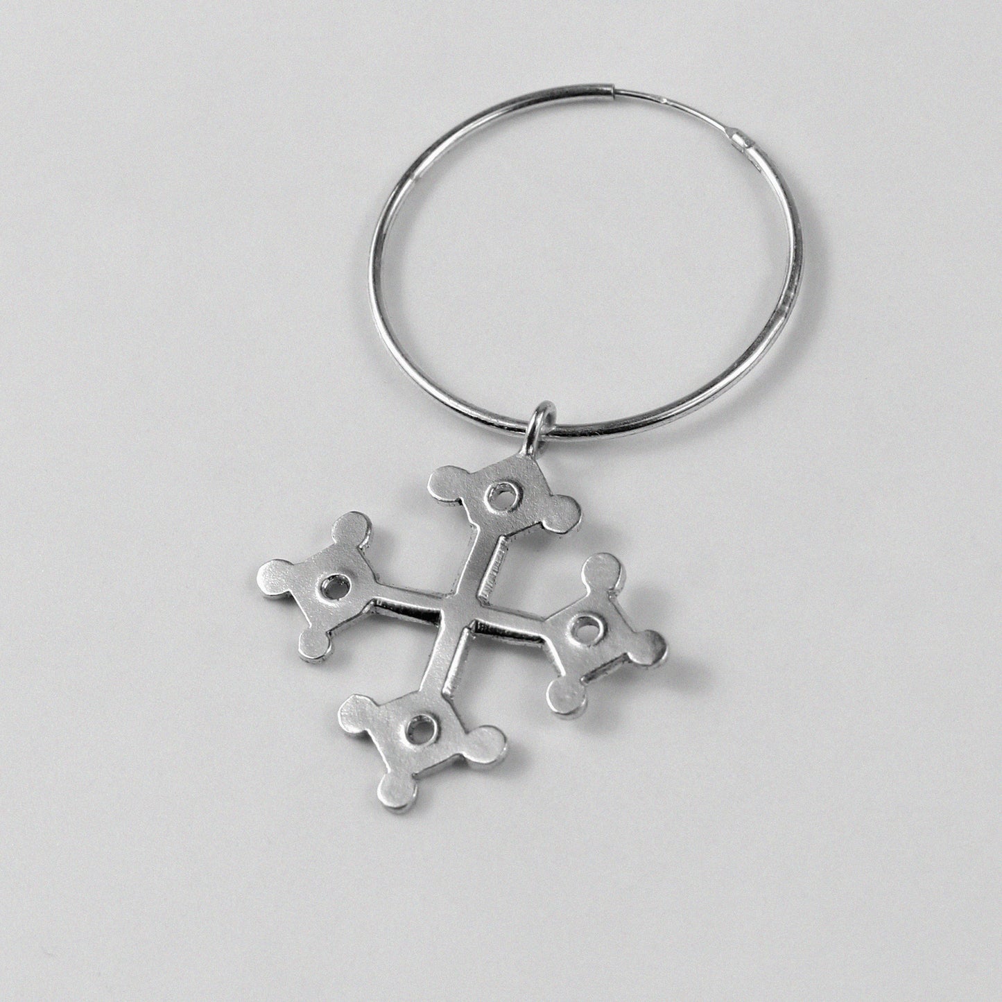Occitan Earrings - An elegant pair of 925 sterling silver earrings by GetTheJuice, featuring an intricate design inspired by the rich history and culture of the Occitan region, adding a touch of heritage and sophistication to any look.
Occitan Earrings - A stunning pair of 925 sterling silver earrings by GetT