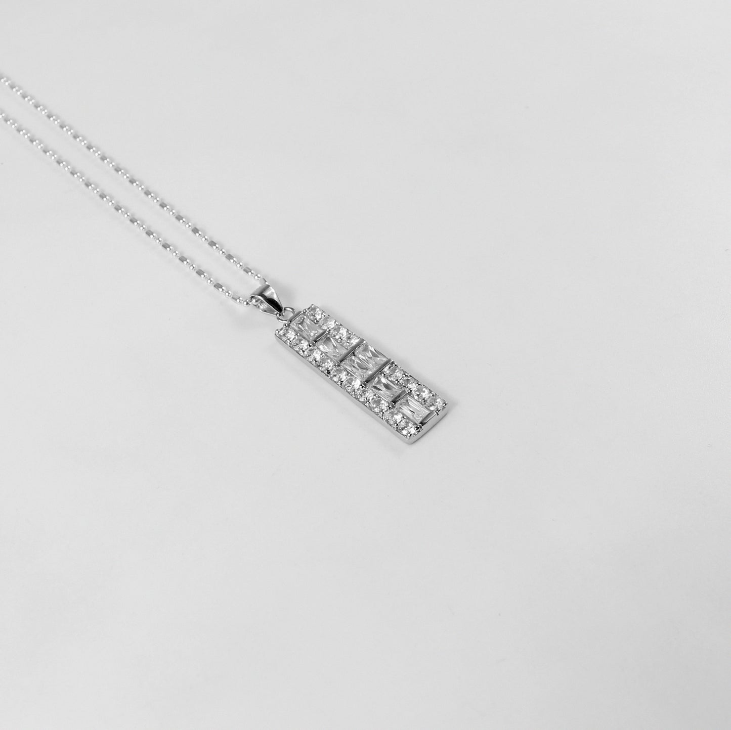 A refined necklace named 'Alba,' crafted from 925 sterling silver. Its design embodies the gentle beauty of dawn, radiating a serene and elegant charm.