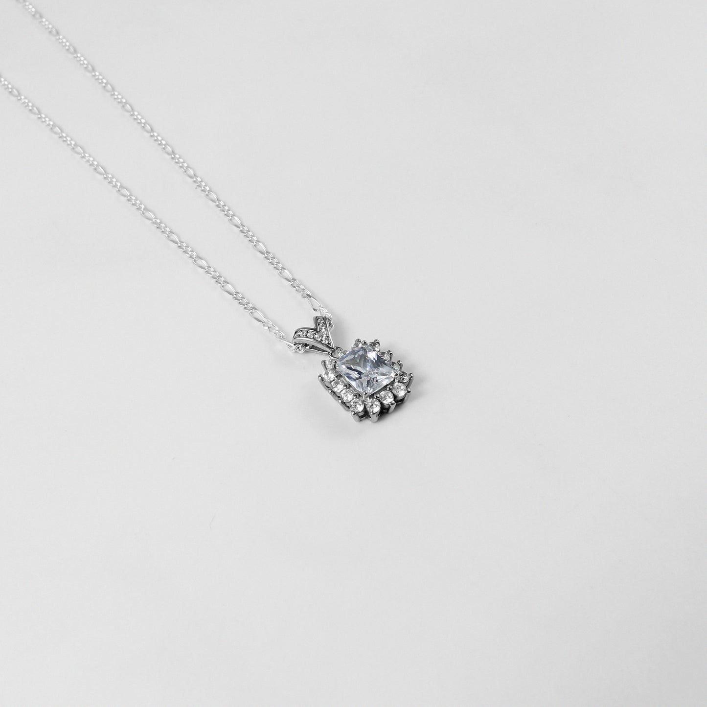 The 'Alpine Jewel' necklace, elegantly crafted from 925 sterling silver, inspired by the pristine beauty and timeless charm of alpine landscapes.