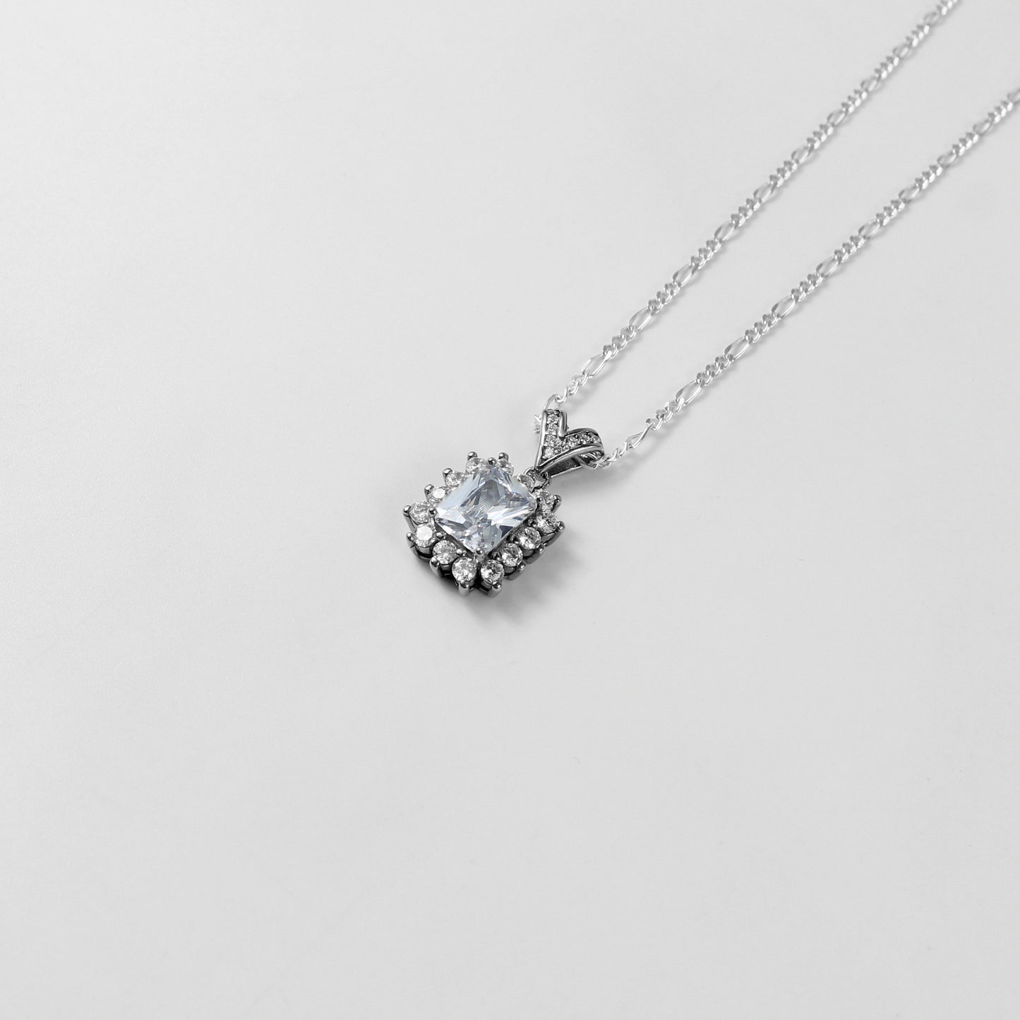 The 'Alpine Jewel' necklace, elegantly crafted from 925 sterling silver, inspired by the pristine beauty and timeless charm of alpine landscapes.