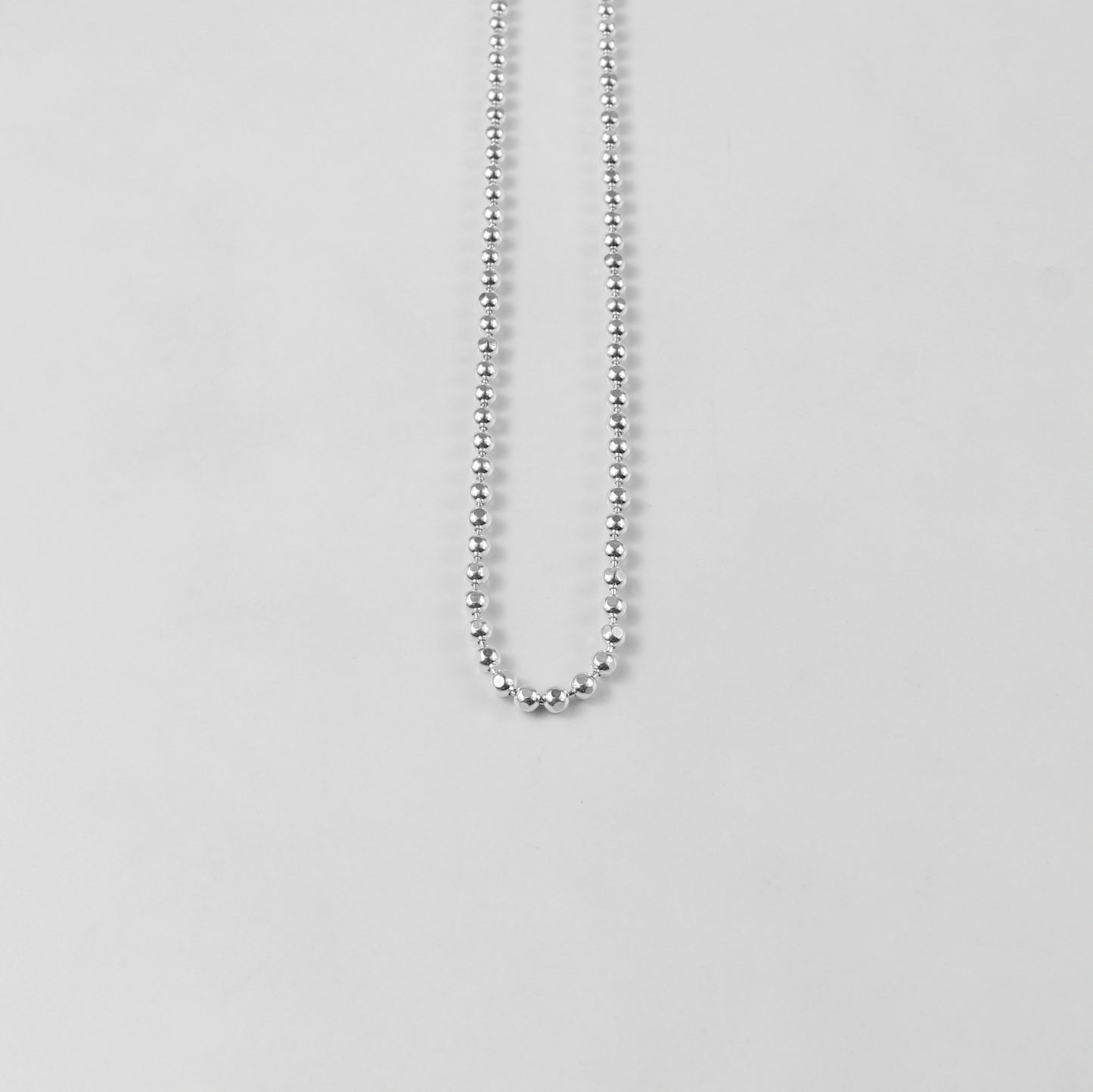 925 Sterling Silver Ball Necklace by GetTheJuice: A sleek and timeless ball necklace crafted from high-quality 925 sterling silver, perfect for adding a touch of elegance to any outfit.