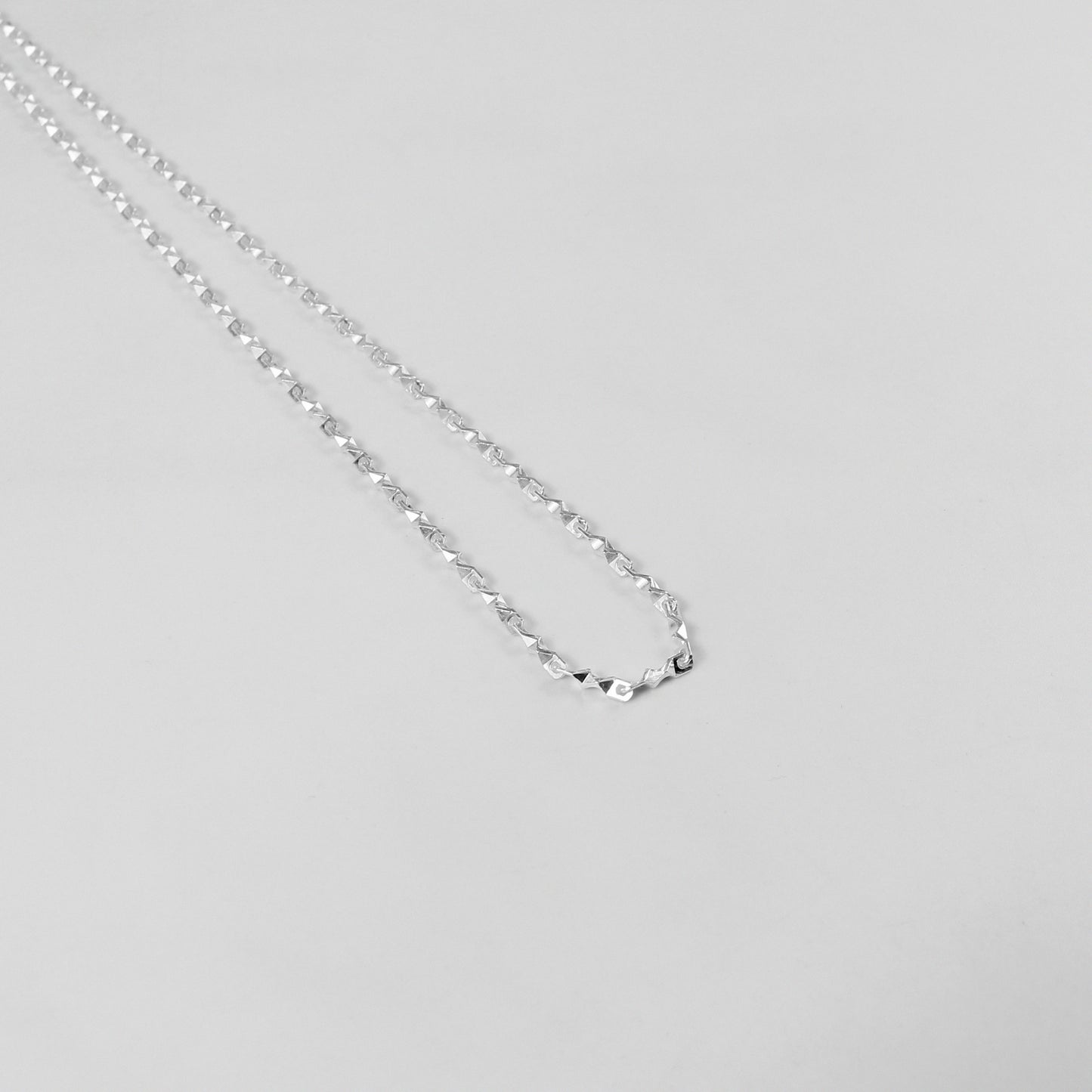 Double Strand Necklace - An elegant 925 sterling silver bracelet by GetTheJuice, showcasing a beautiful double strand pattern for a delicate and stylish look.