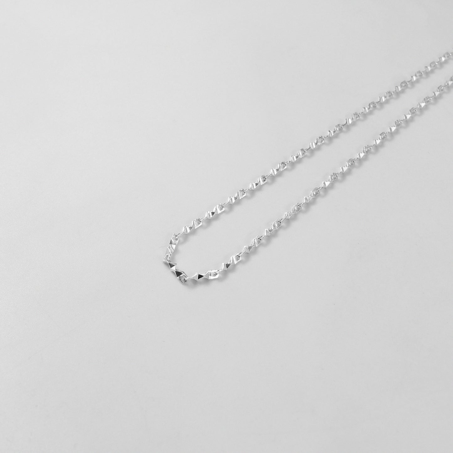 Double Strand Necklace - An elegant 925 sterling silver bracelet by GetTheJuice, showcasing a beautiful double strand pattern for a delicate and stylish look.