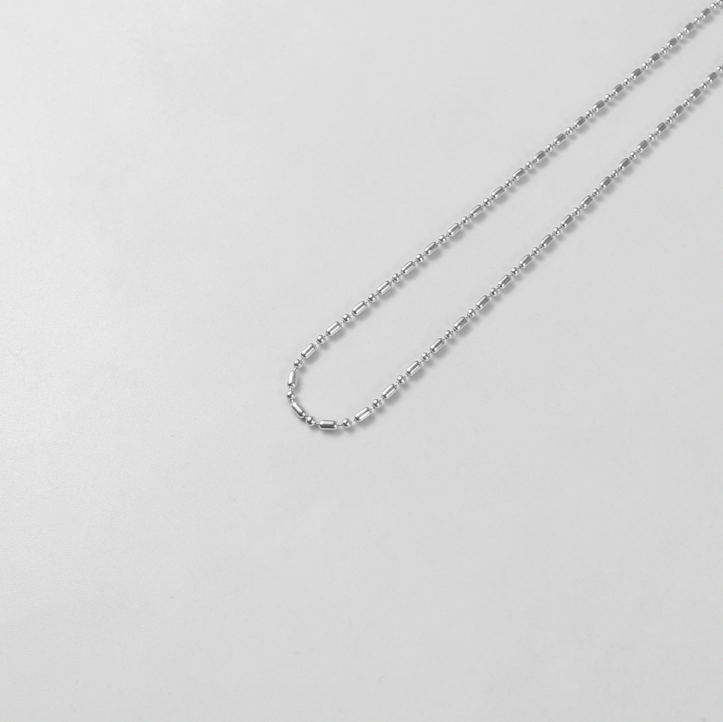 925 sterling silver necklace named 'Ethereal Silver Bead,' featuring a delicate strand of luminous silver beads that exude elegance and simplicity. Its refined design captures an otherworldly charm, making it a versatile accessory for both casual and formal occasions.