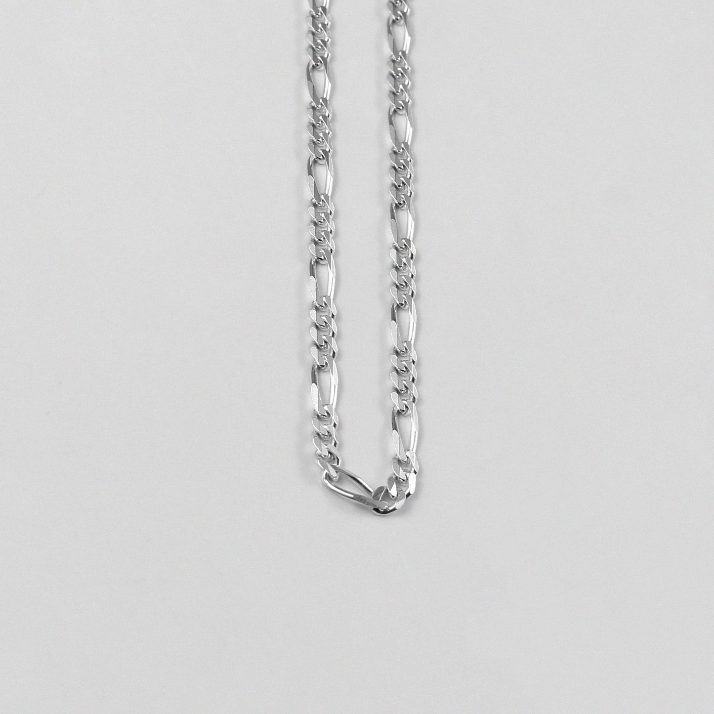 Figaro Necklace - A classic 925 sterling silver necklace by GetTheJuice, featuring the timeless Figaro link design that adds a touch of elegance and sophistication to any outfit.