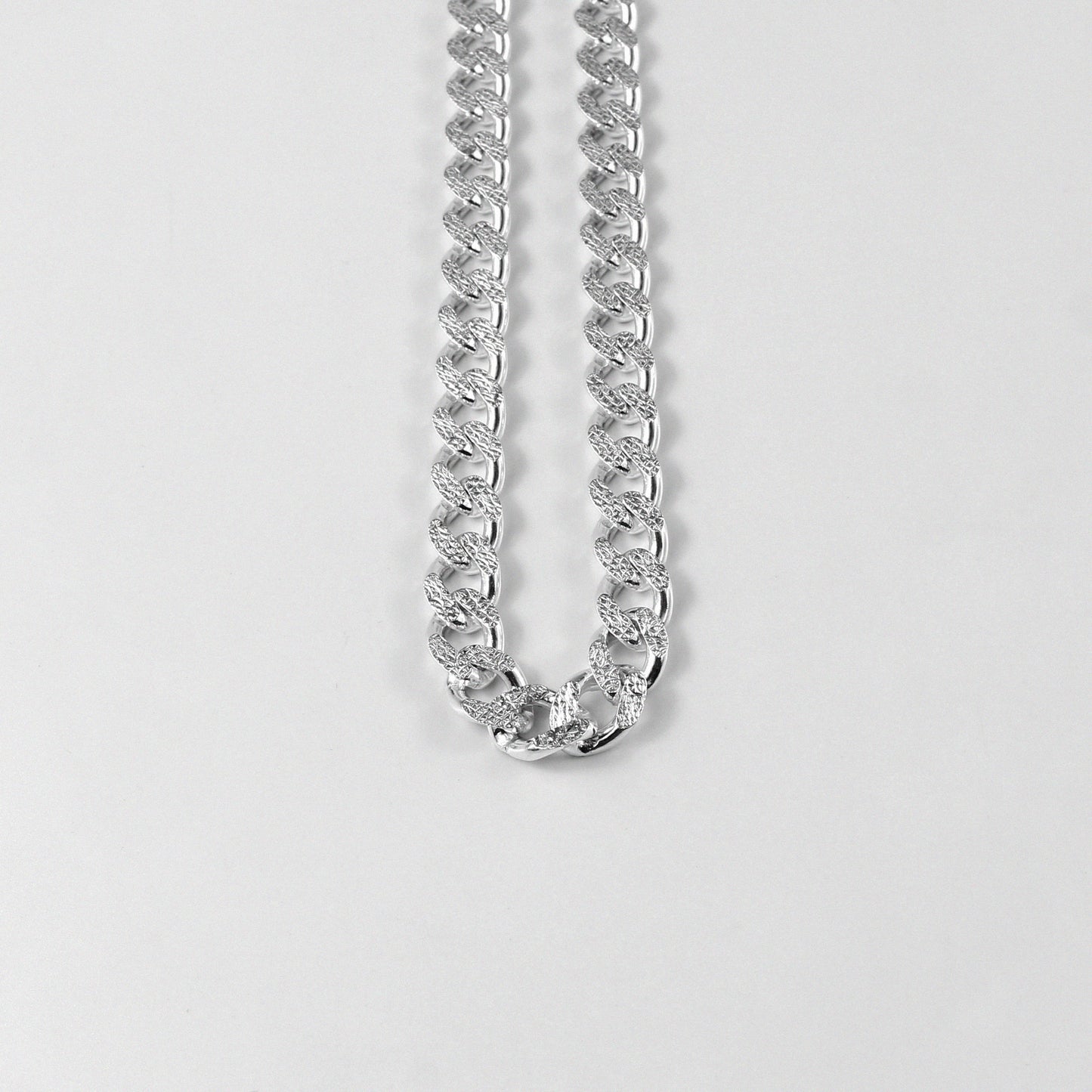 Frosted Fusion Cuban Necklace - A distinctive 925 sterling silver necklace by GetTheJuice, featuring a unique frosted finish on the classic Cuban link design, blending elegance with contemporary style.
