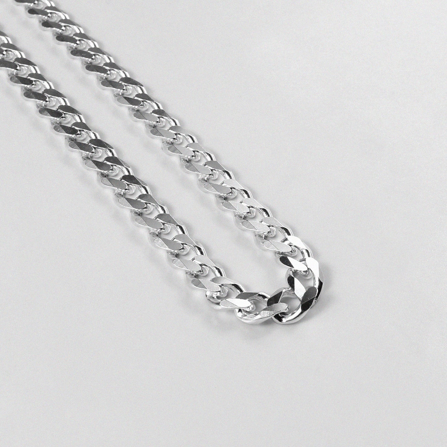 Frosted Fusion Cuban Necklace - A distinctive 925 sterling silver necklace by GetTheJuice, featuring a unique frosted finish on the classic Cuban link design, blending elegance with contemporary style.