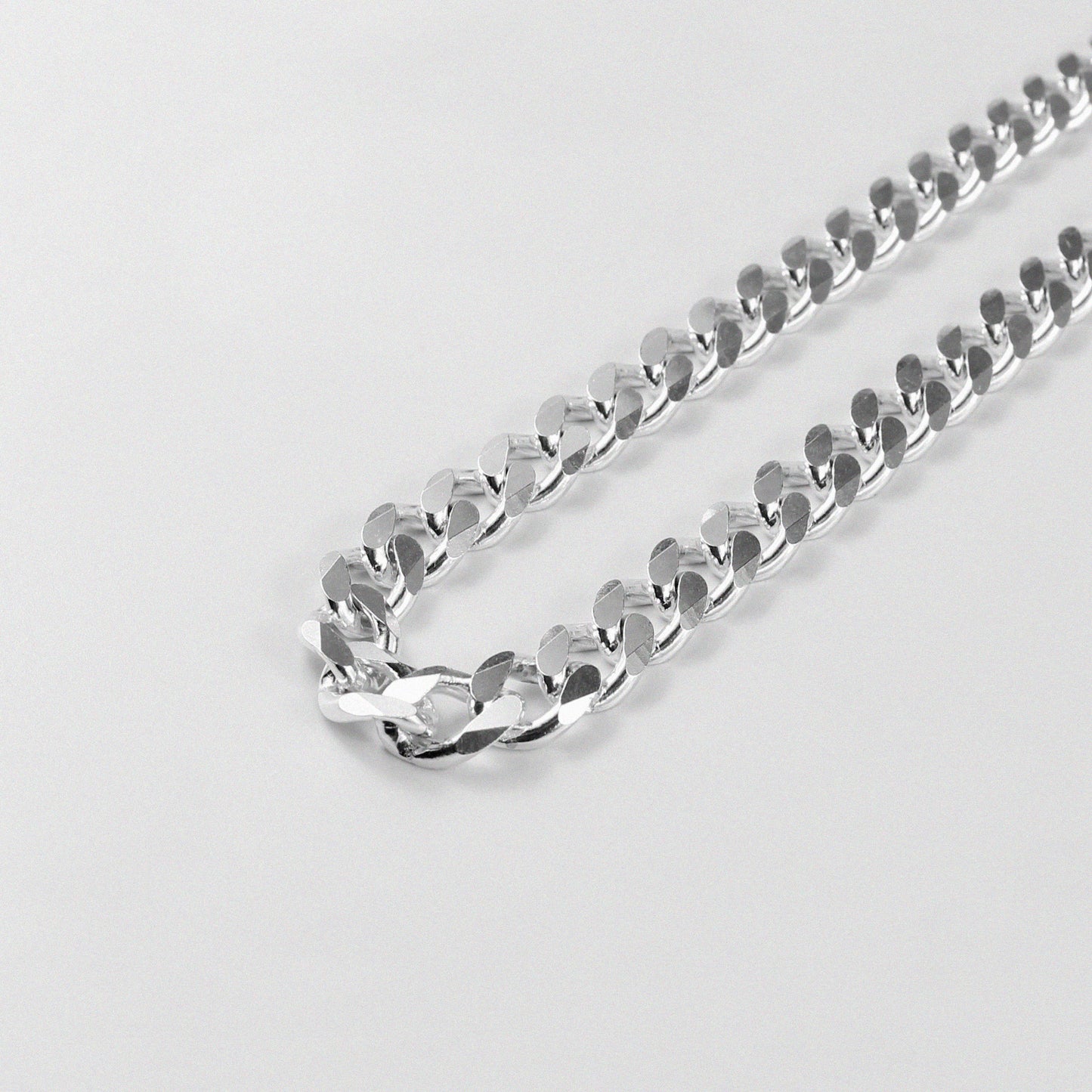 Frosted Fusion Cuban Necklace - A distinctive 925 sterling silver necklace by GetTheJuice, featuring a unique frosted finish on the classic Cuban link design, blending elegance with contemporary style.