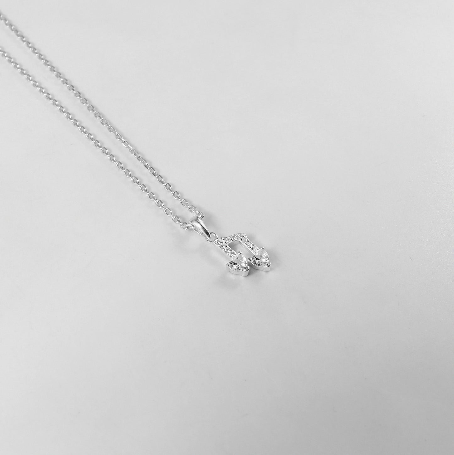 925 sterling silver necklace named 'Harmony,' featuring a graceful and balanced design that symbolizes unity and elegance. Its minimalist style and refined craftsmanship make it a timeless accessory suited for any occasion.