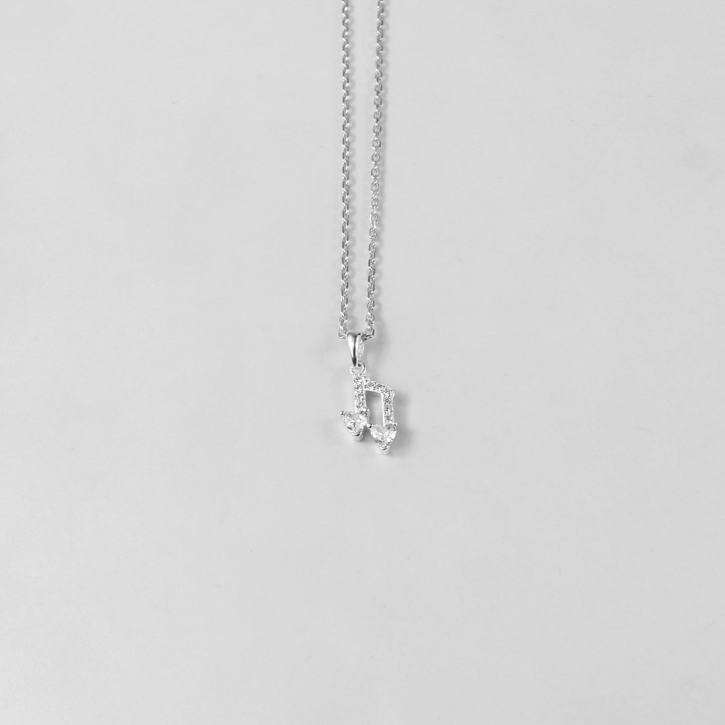 925 sterling silver necklace named 'Harmony,' featuring a graceful and balanced design that symbolizes unity and elegance. Its minimalist style and refined craftsmanship make it a timeless accessory suited for any occasion.