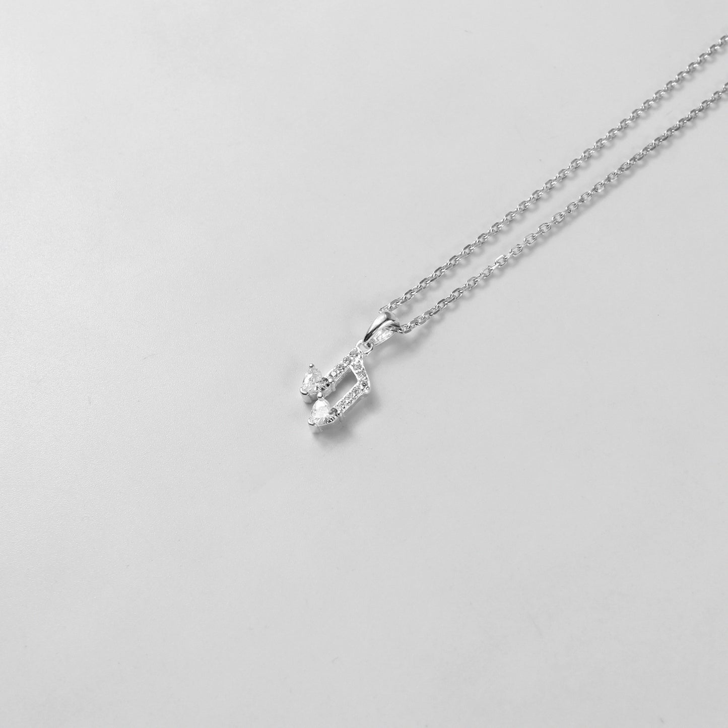 925 sterling silver necklace named 'Harmony,' featuring a graceful and balanced design that symbolizes unity and elegance. Its minimalist style and refined craftsmanship make it a timeless accessory suited for any occasion.
